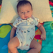 Khai is registered to the contest to win money with this photo: baby, backyard, blanket, clothing, cushion, face, furniture, grass, head, homedecor, nature, newborn, person, photography, plant, portrait, quilt, shorts, sitting, summer