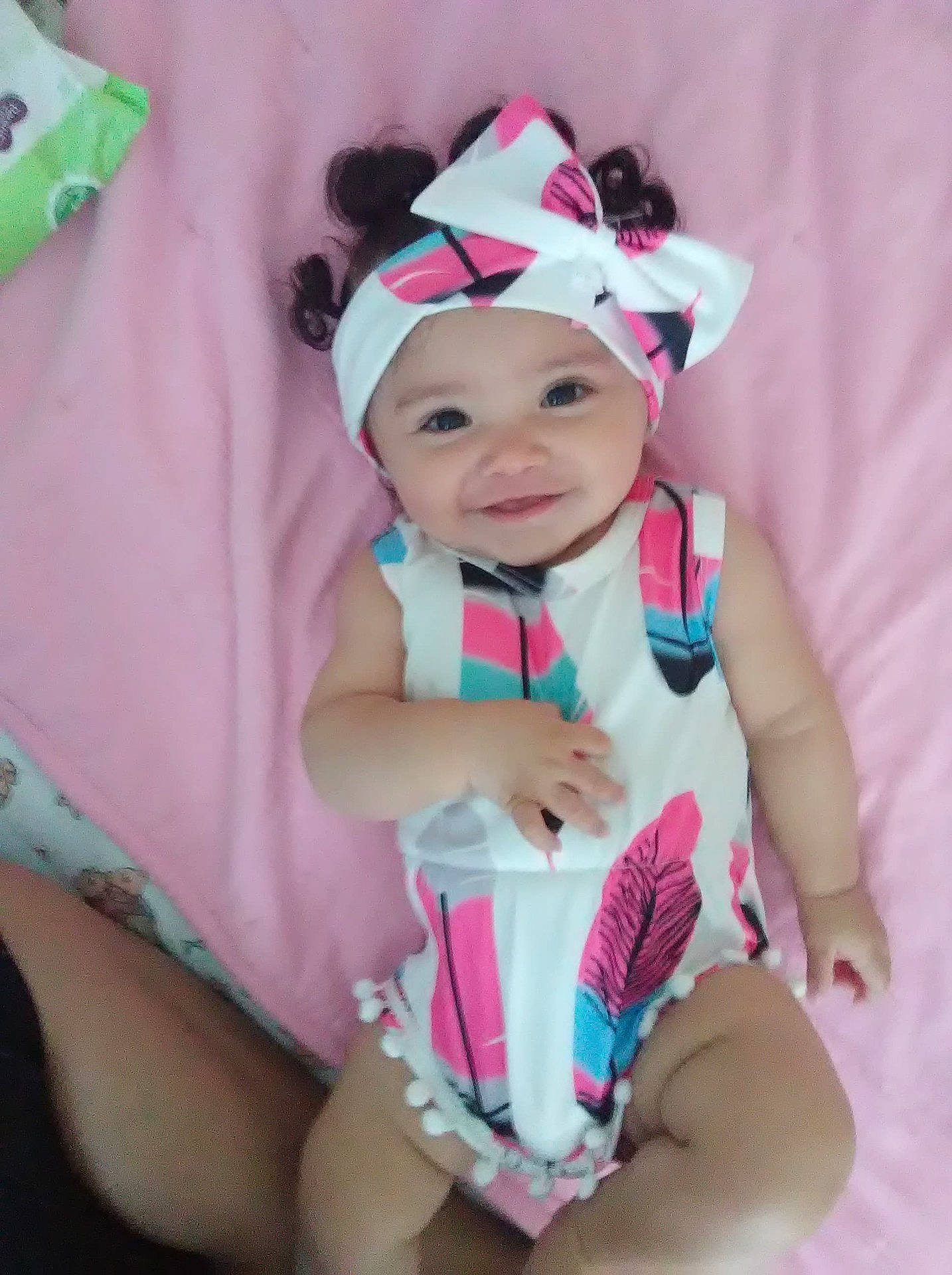 Serenity is registered to the contest to win money with this photo: baby_products, child, costume, girl, hair_accessory, headgear, headwear, infant, person, pink, product, skin, smile, textile, toddler