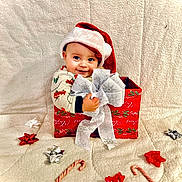 Dawson Lee is registered to the contest to win money with this photo: accessories, baby, bonnet, cap, clothing, costume, couch, dress, face, furniture, happy, hat, head, leaf, person, photography, plant, portrait, sitting, smile