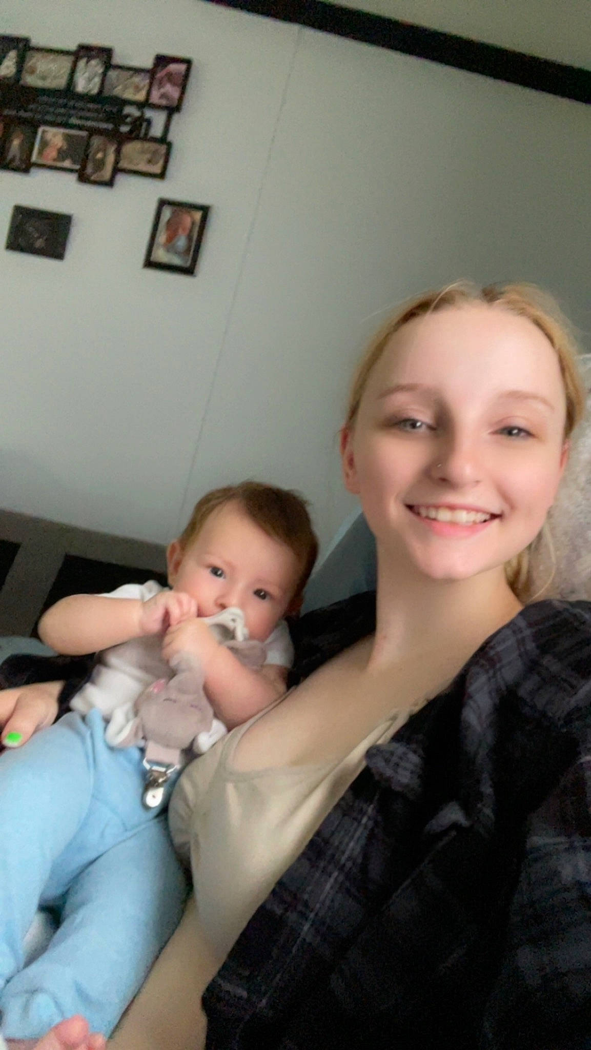 Elijah is registered to the contest to win money with this photo: arm, baby, cheek, child, comfort, couch, event, eye, fun, happy, iris, joy, person, picture_frame, plaid, shoulder, sitting, skin, smile, tartan