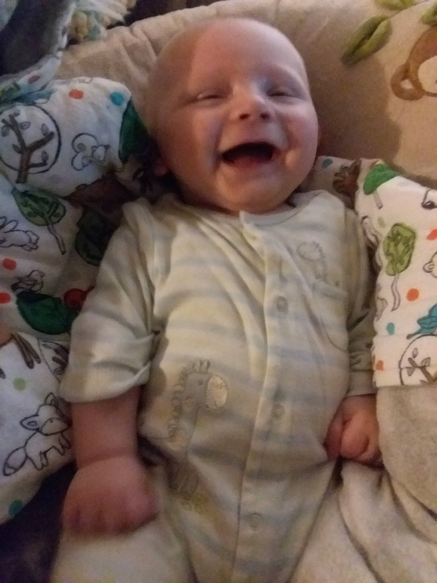 Bradyn is registered to the contest to win money with this photo: arm, bedtime, boy, cheek, child, day, eye, face, facial_expression, finger, head, infant, mouth, nose, person, product, skin, sleep, smile, toddler