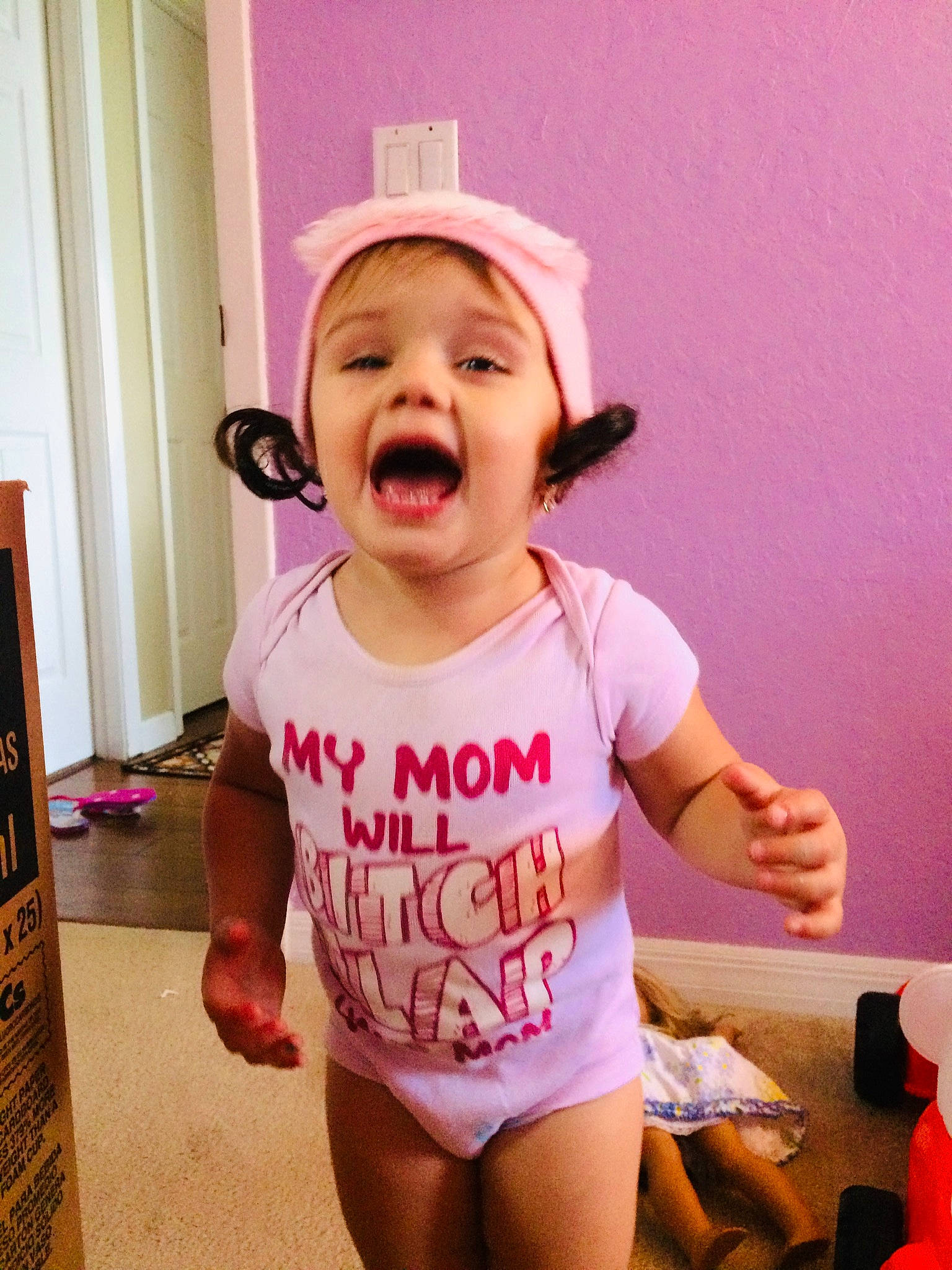Jasmine is registered to the contest to win money with this photo: arm, baby, baby_laughing, baby_toddler_clothing, cheek, child, daughter, ear, face, facial_expression, happy, head, headwear, mouth, person, pink, skin, sleeve, smile, t_shirt