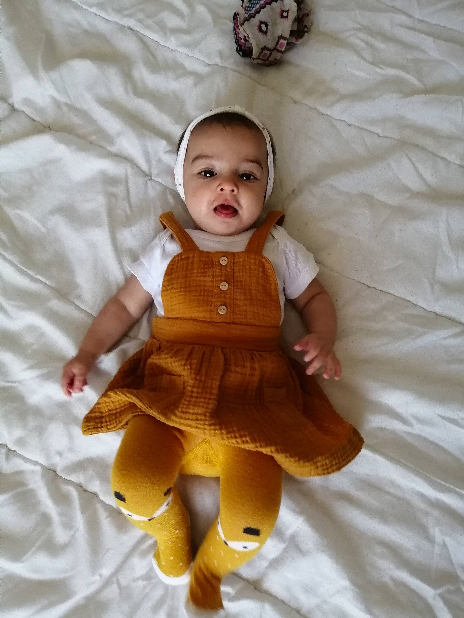 Maëlya a rejoint le concours — aidez-le/la à gagner de superbes lots ! baby, child, doll, head, person, skin, smile, stuffed_toy, toddler, toy, yellow