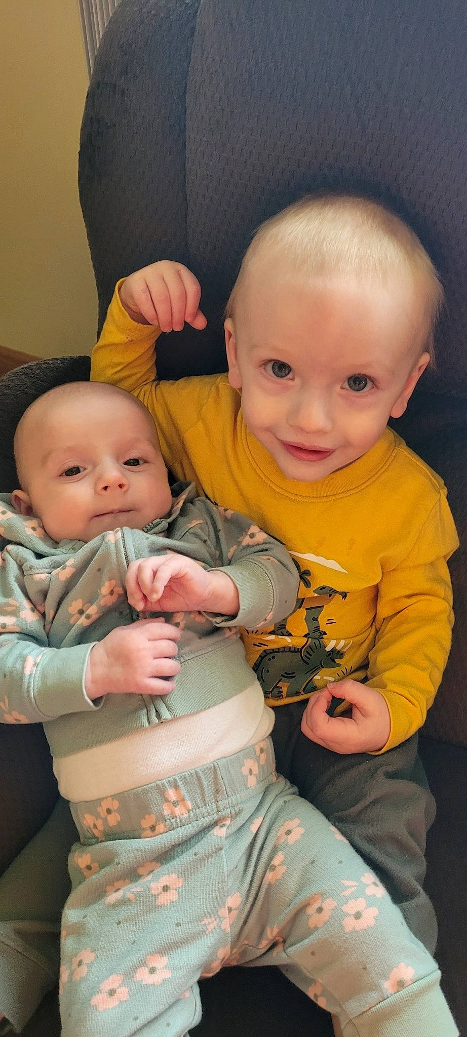 Isaiah is registered to the contest to win money with this photo: baby, baby_toddler_clothing, cheek, chin, facial_expression, finger, gesture, hairstyle, happy, iris, mammal, mouth, nose, organ, person, photograph, skin, sleeve, smile, standing