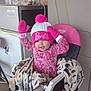 Melody is registered to the contest to win money with this photo: toddler, child, baby, pink_hat, mittens, blanket, stroller, cosco_kids, boots, smile, indoor, clothing, toy, happy, face, person, window, water_bottle, microwave, blanket_pattern