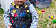 Paolo participe au concours pour gagner de l'argent avec cette photo : backyard, boy, child, clothing, coat, face, footwear, grass, head, jacket, jeans, male, nature, outdoors, pants, person, photography, plant, portrait, shoe