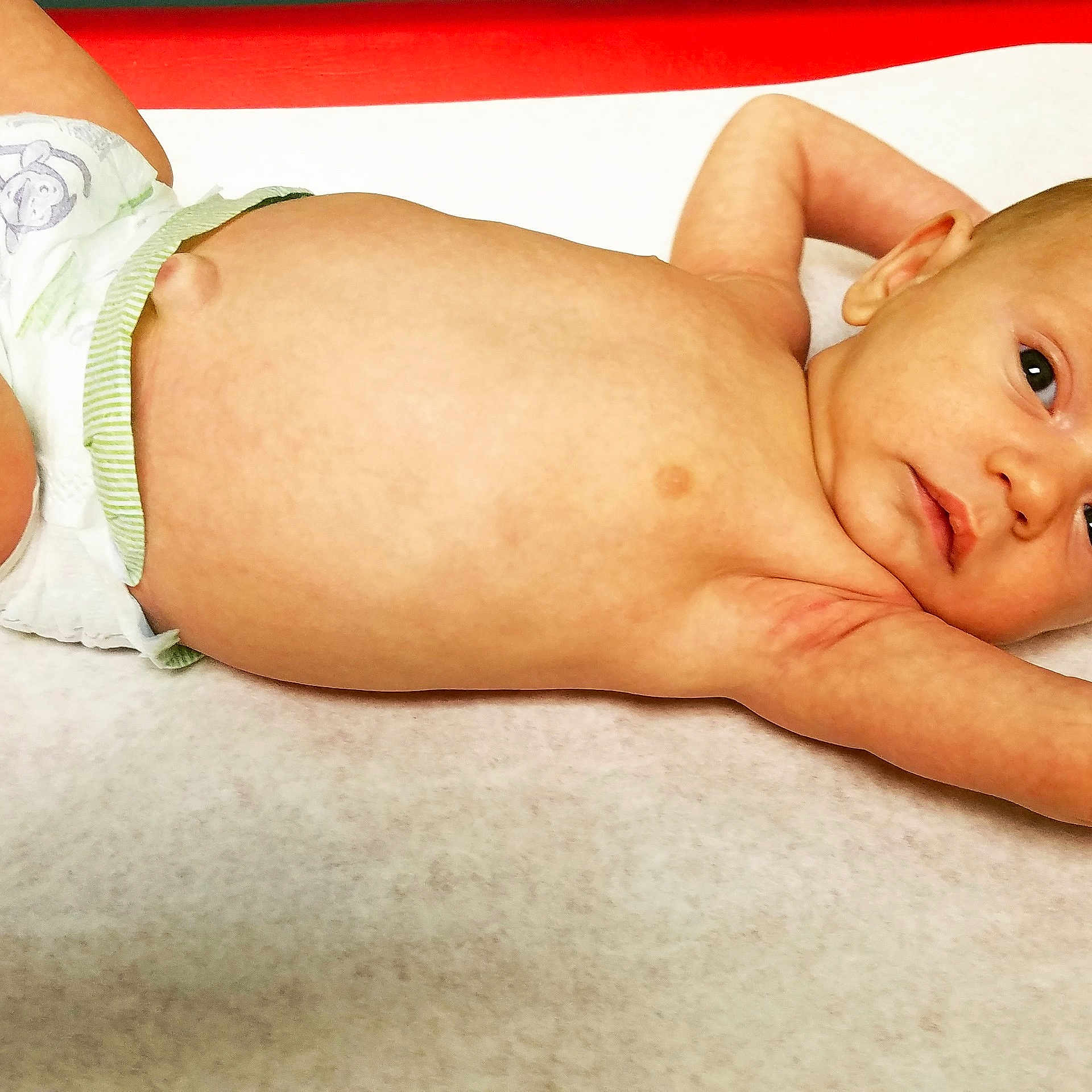 Jax is registered to the contest to win money with this photo: abdomen, arm, chest, child, finger, infant, stomach