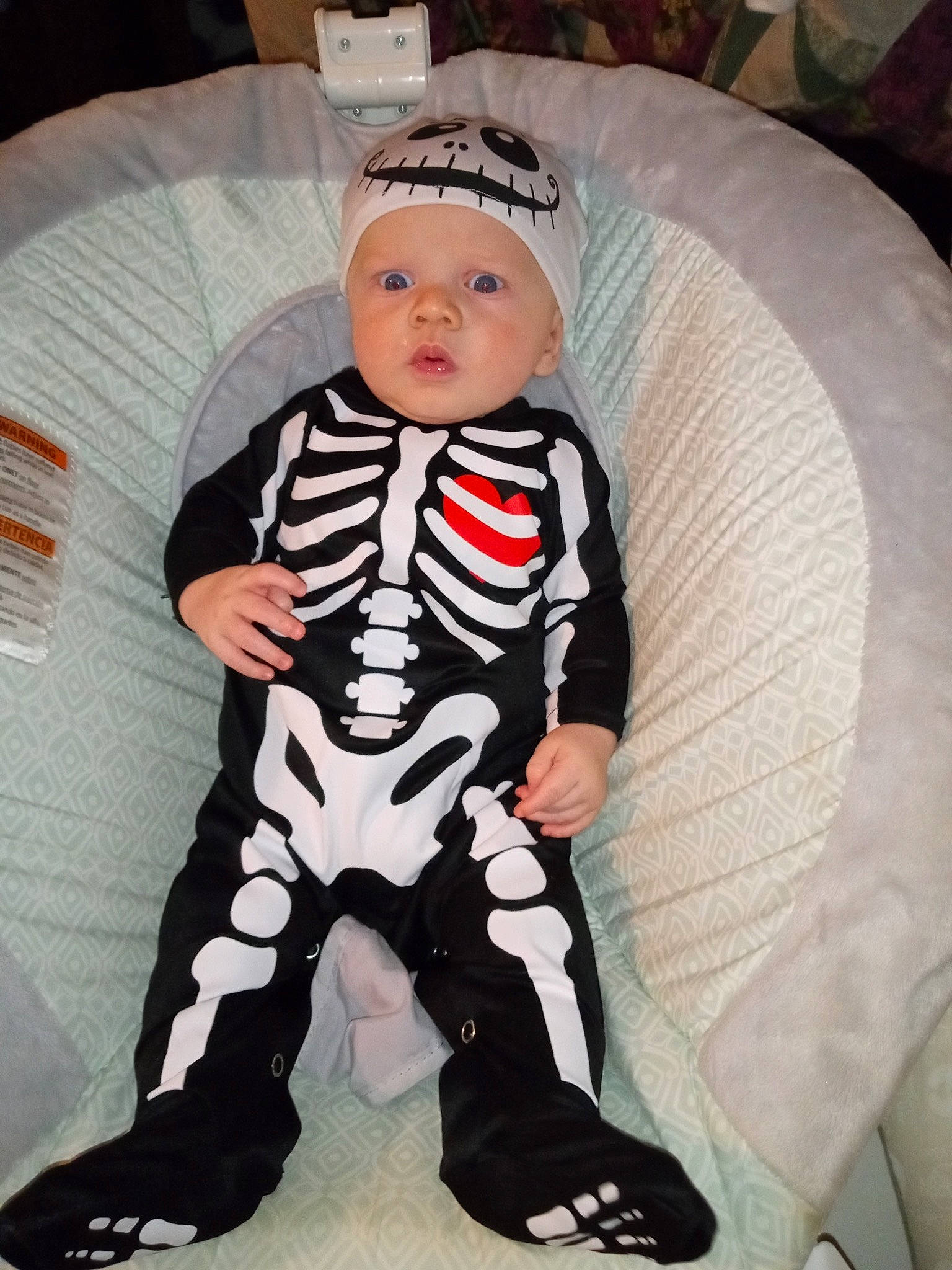 Jacob is registered to the contest to win money with this photo: baby, baby_products, baby_toddler_clothing, carmine, child, comfort, costume, fictional_character, fur, hat, headwear, knee, lap, linens, pattern, person, personal_protective_equipment, sitting, sleeve, stuffed_toy