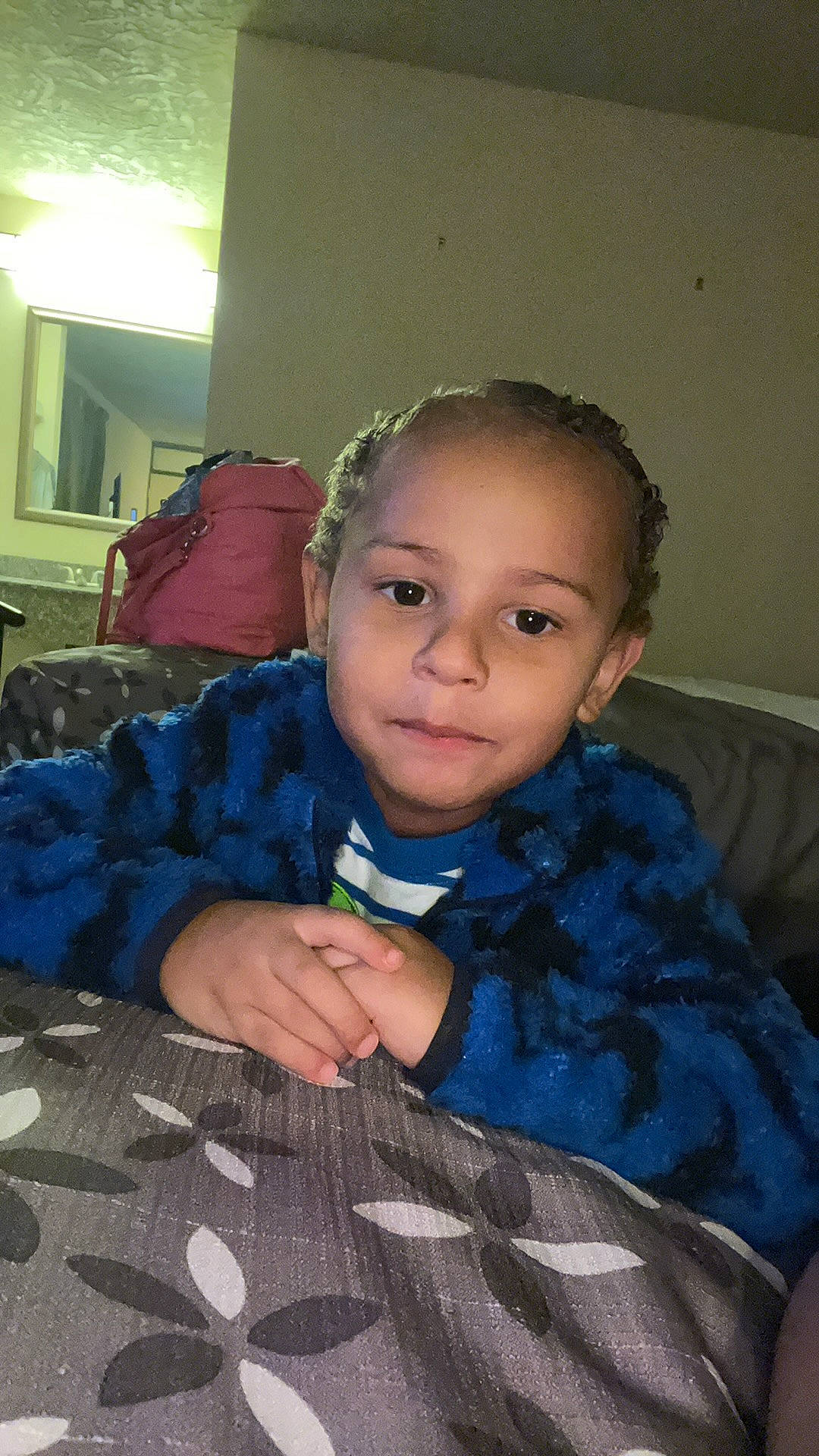 Zayveon is registered to the contest to win money with this photo: baby_toddler_clothing, chair, cheek, child, comfort, cool, couch, electric_blue, eyebrow, flooring, formal_wear, fun, happy, iris, linens, pattern, person, room, sitting, sleeve