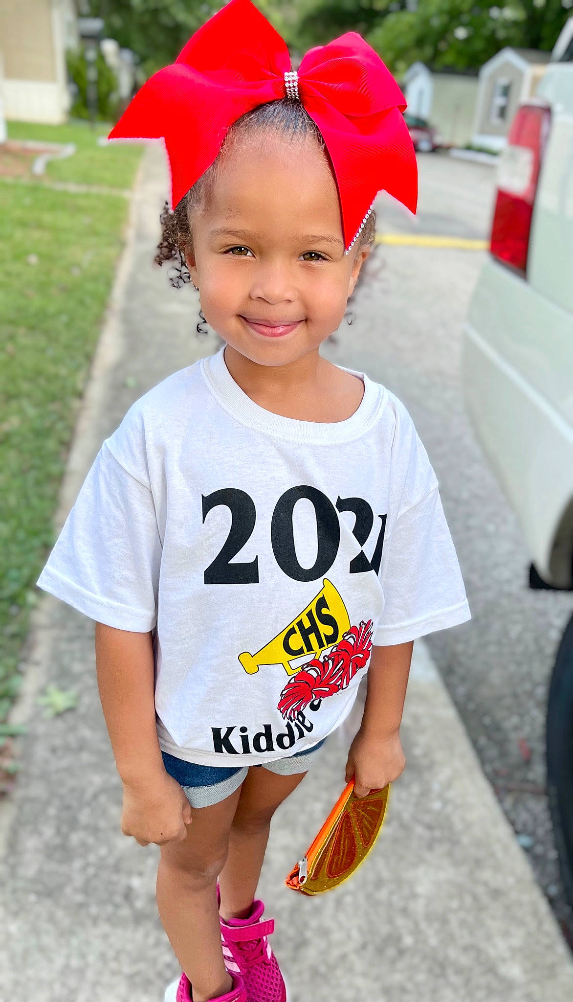 Kahlia is registered to the contest to win money with this photo: baby_toddler_clothing, child, cool, event, eyewear, face, fun, happy, headgear, headpiece, headwear, joy, person, photograph, pink, sleeve, smile, snapshot, street_fashion, t_shirt