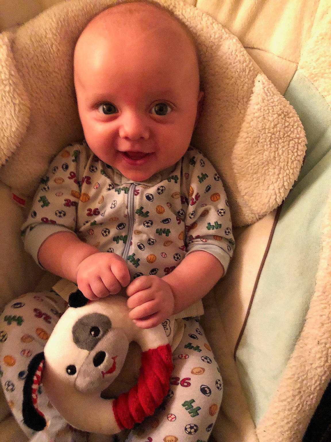 Klayton is registered to the contest to win money with this photo: cheek, child, ear, eye, face, finger, head, infant, iris, lip, mouth, nose, person, play, product, skin, smile, stuffed_toy, textile, toddler