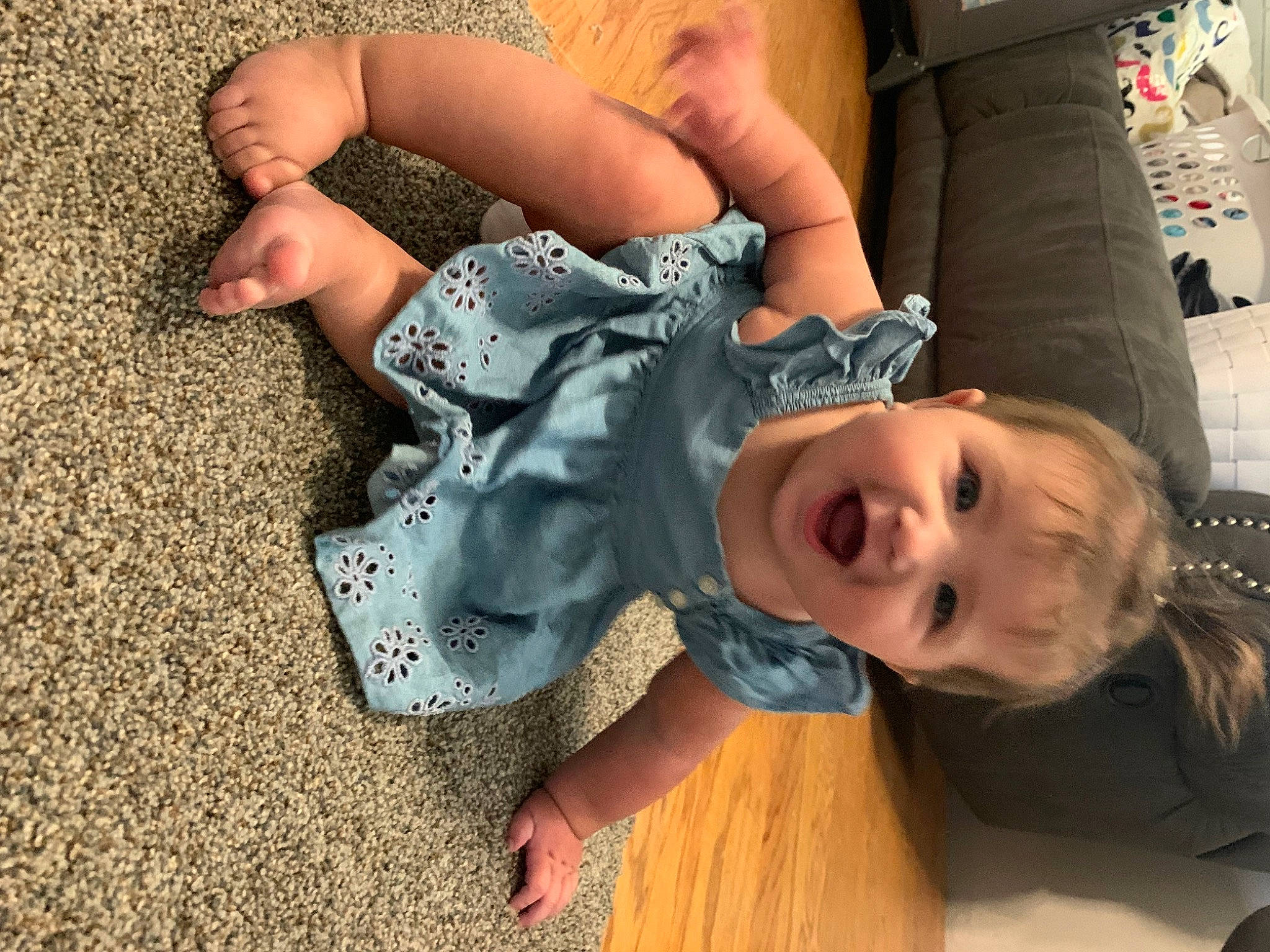 Arwen is registered to the contest to win money with this photo: baby_toddler_clothing, barefoot, child, finger, flooring, foot, fun, hand, happy, head, human_leg, joint, mouth, person, sitting, skin, thigh, thumb, toddler, tree