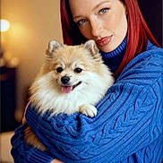 Nala a rejoint le concours — aidez-le/la à gagner de superbes lots ! affection, blue_sweater, close_up, companion, cozy, cute, dog, friendly, furry, happy, hugging, indoor, long_hair, pet, pomeranian, portrait, red_hair, smiling_dog, warm_lighting, woman