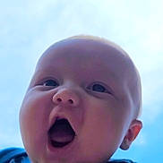 Avery joined the competition — help win amazing prizes! baby, child, face, closeup, expression, mouth_open, sky, blue_sky, outdoor, cute, joyful, surprised, infant, person, clothing, toddler, head, cheeks, animal_patch, casual