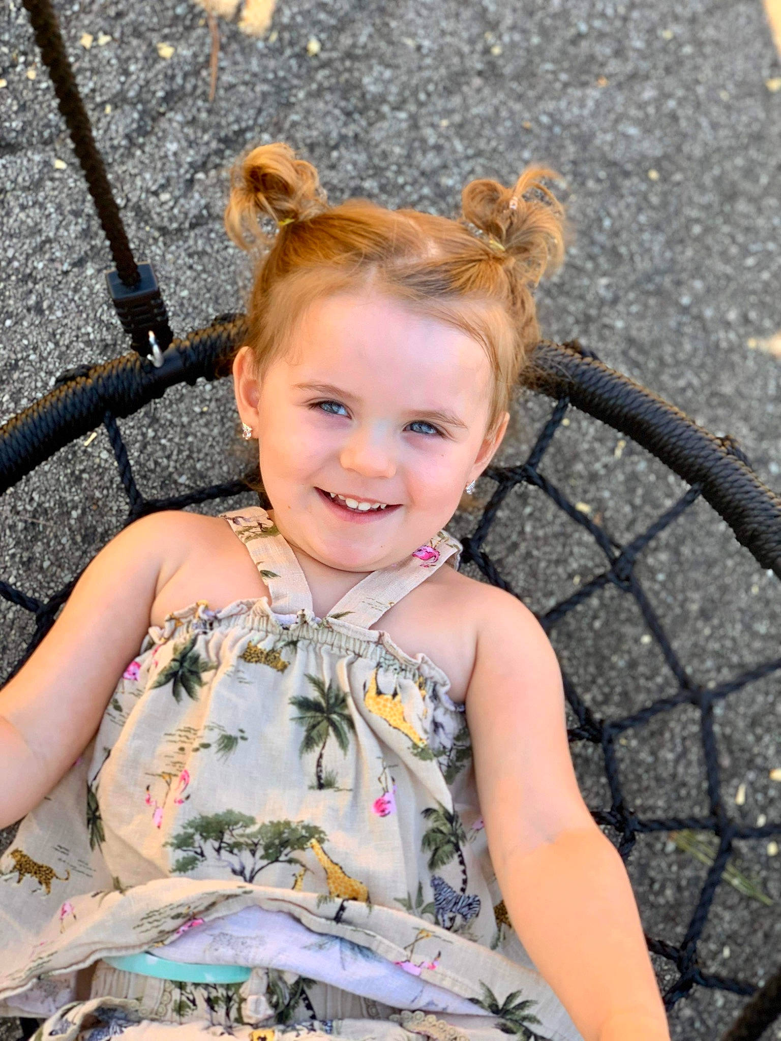 Teagan joined the competition — help win amazing prizes! baby_toddler_clothing, bicycle_tire, blond, child, eye, facial_expression, fun, grass, hair, happy, head, iris, joy, leisure, person, recreation, sitting, skin, smile, spring