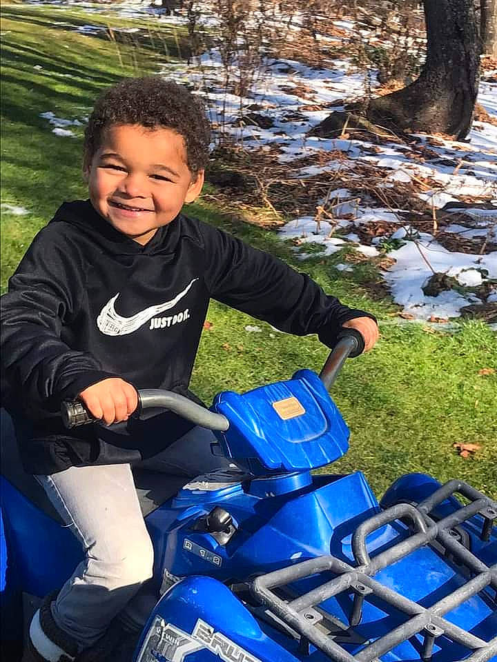 Graysen joined the competition — help win amazing prizes! automotive_design, automotive_exterior, automotive_tire, bag, blue, child, electric_blue, fun, grass, joy, leisure, luggage_and_bags, motor_vehicle, nature, people_in_nature, person, personal_protective_equipment, photograph, recreation, smile