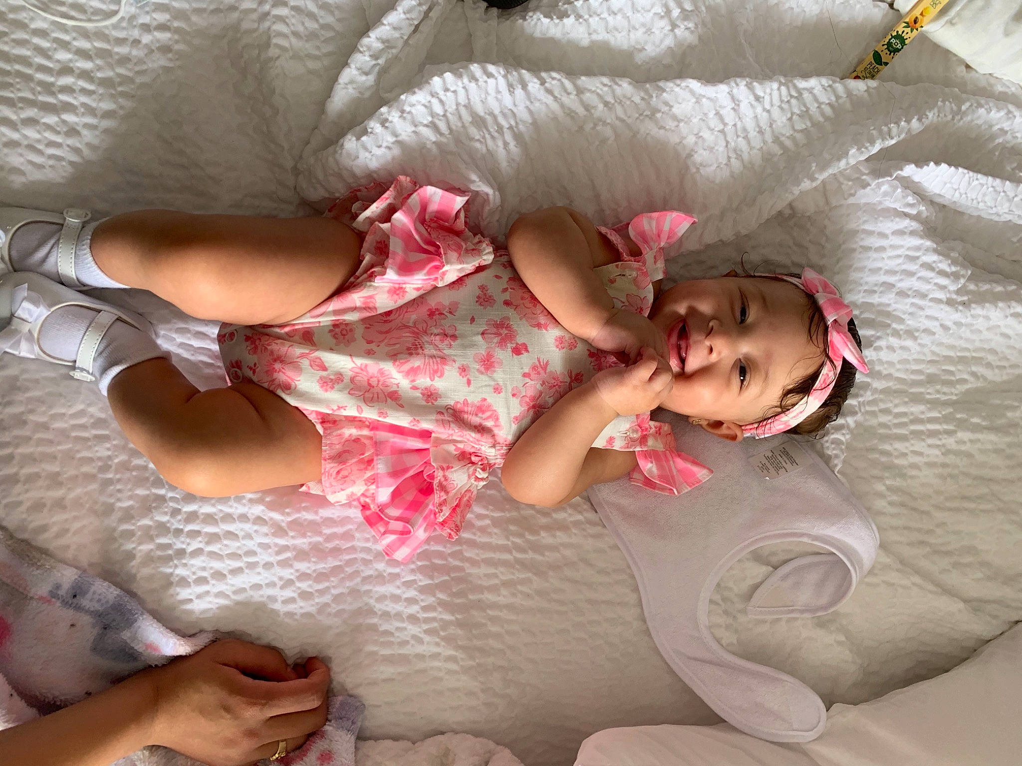 Avriana is registered to the contest to win money with this photo: arm, baby, baby_sleeping, baby_toddler_clothing, child, comfort, eye, face, finger, hand, head, headwear, human_body, joint, leg, linens, mouth, person, pink, skin