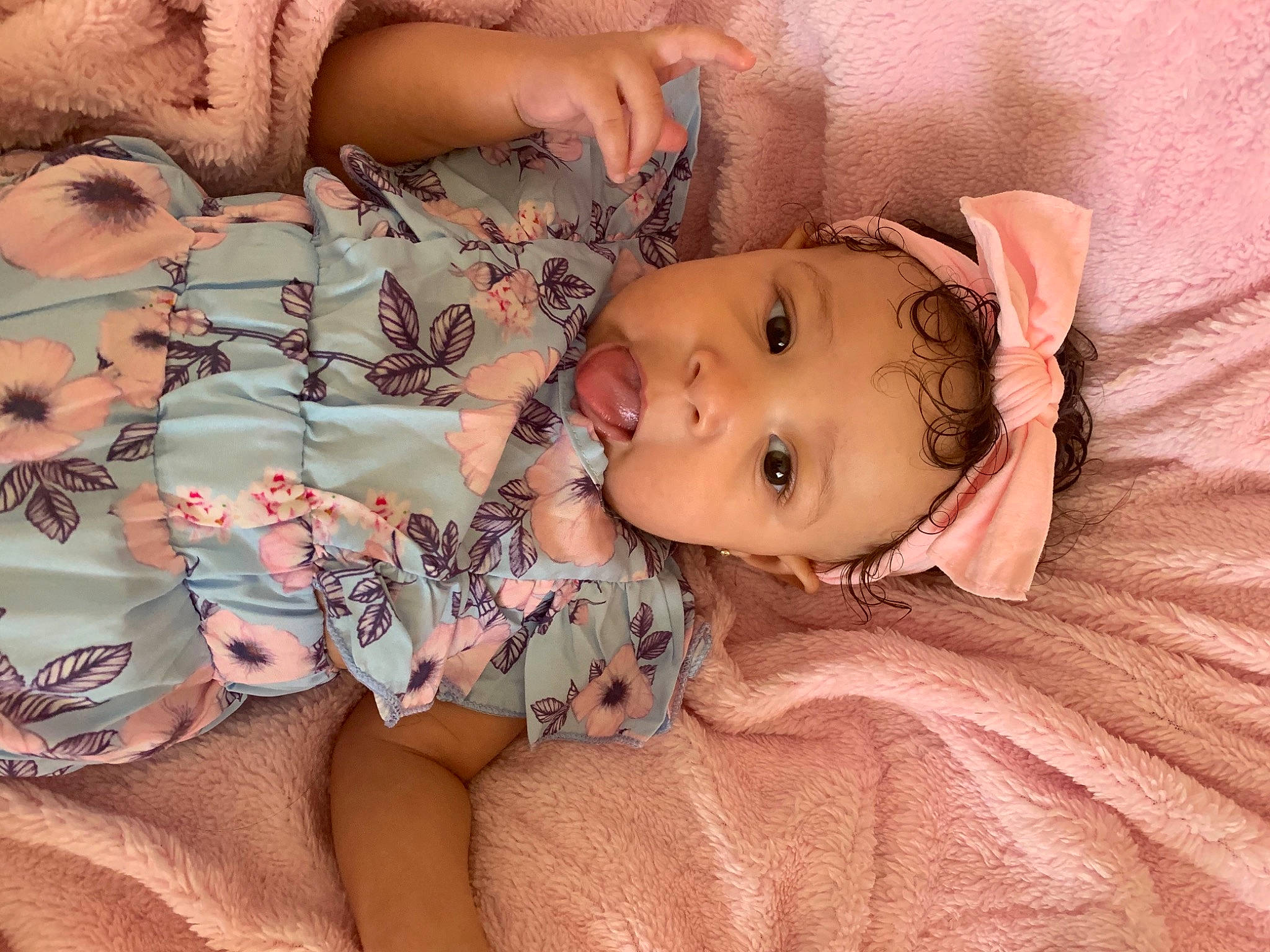 Avriana is registered to the contest to win money with this photo: arm, baby_toddler_clothing, cheek, eyebrow, eyelash, facial_expression, hand, human_body, lip, mammal, mouth, muscle, neck, nose, person, pink, product, skin, sleeve, textile