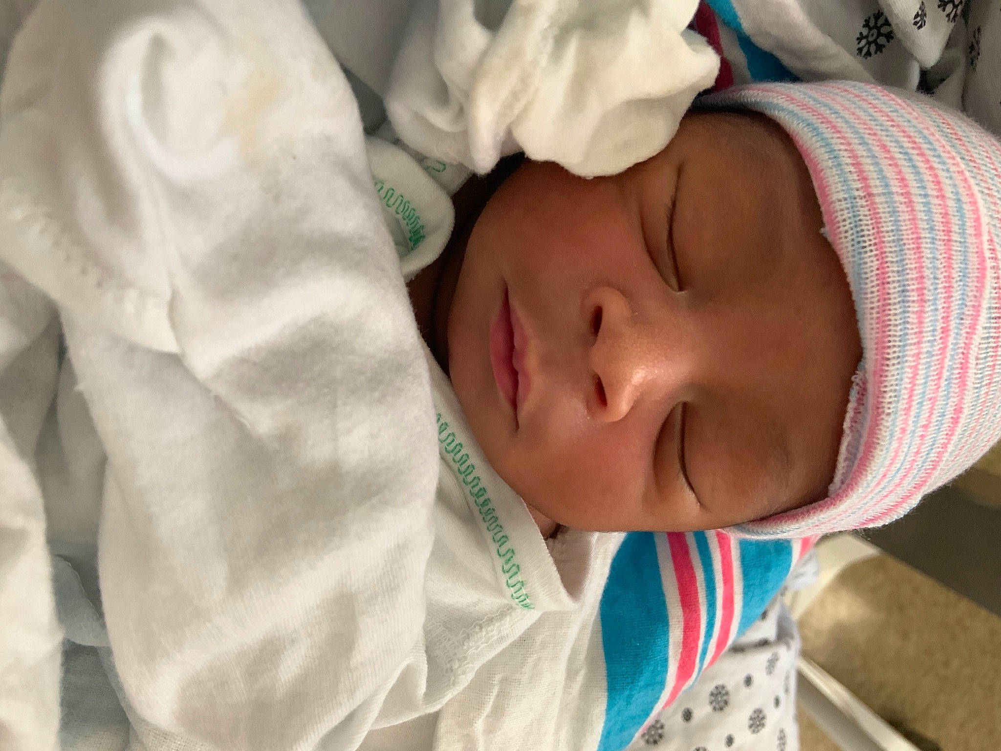 Kooper is registered to the contest to win money with this photo: baby, baby_products, baby_toddler_clothing, cheek, child, chin, comfort, eye, eyebrow, eyelash, linens, lip, mouth, neck, nose, person, skin, sleeve, smile, textile