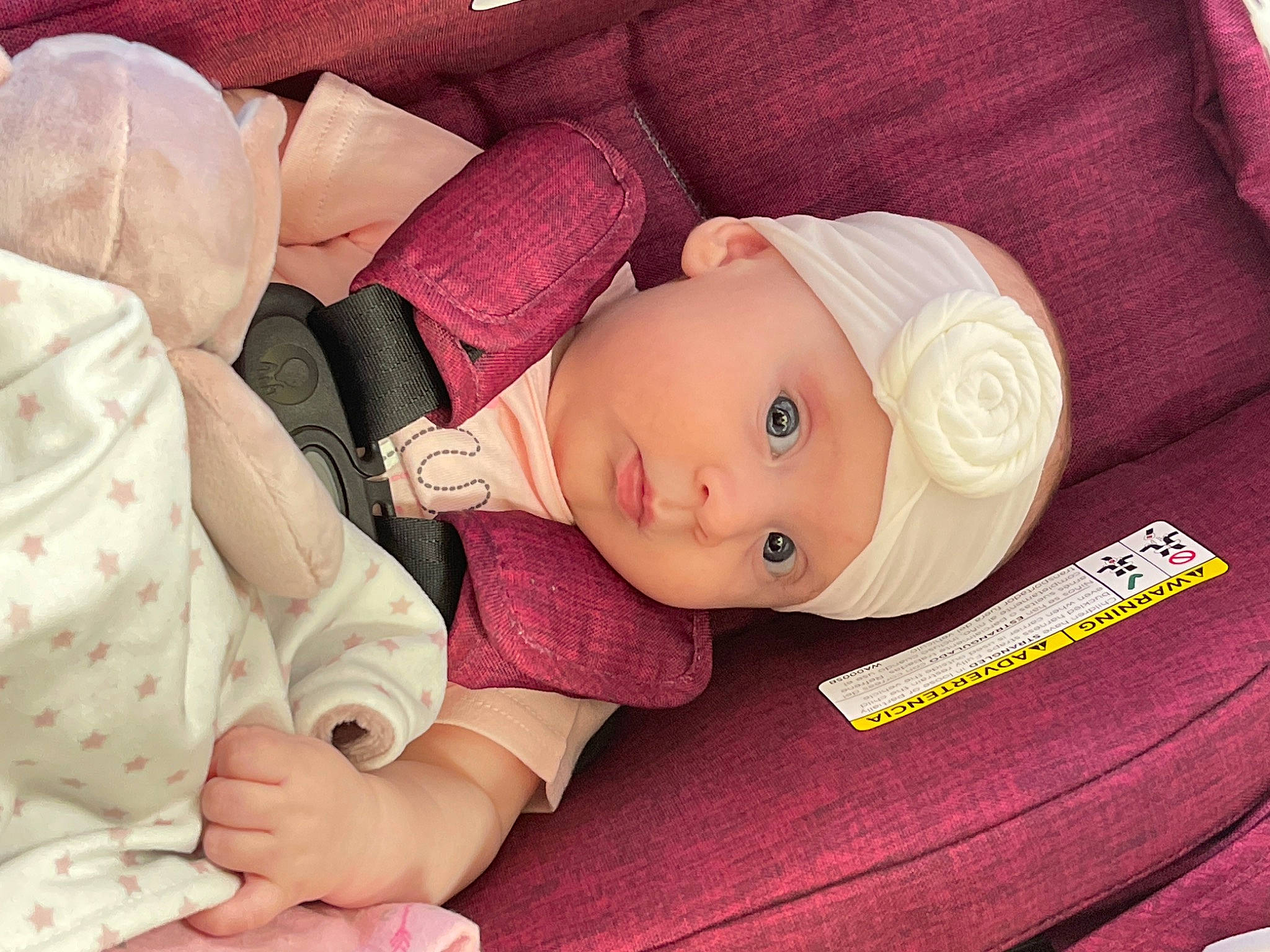 Alaina joined the competition — help win amazing prizes! baby, baby_toddler_clothing, cap, cheek, child, comfort, doll, eye, eyelash, fashion_accessory, headwear, linens, lip, magenta, person, pink, product, skin, sleeve, textile