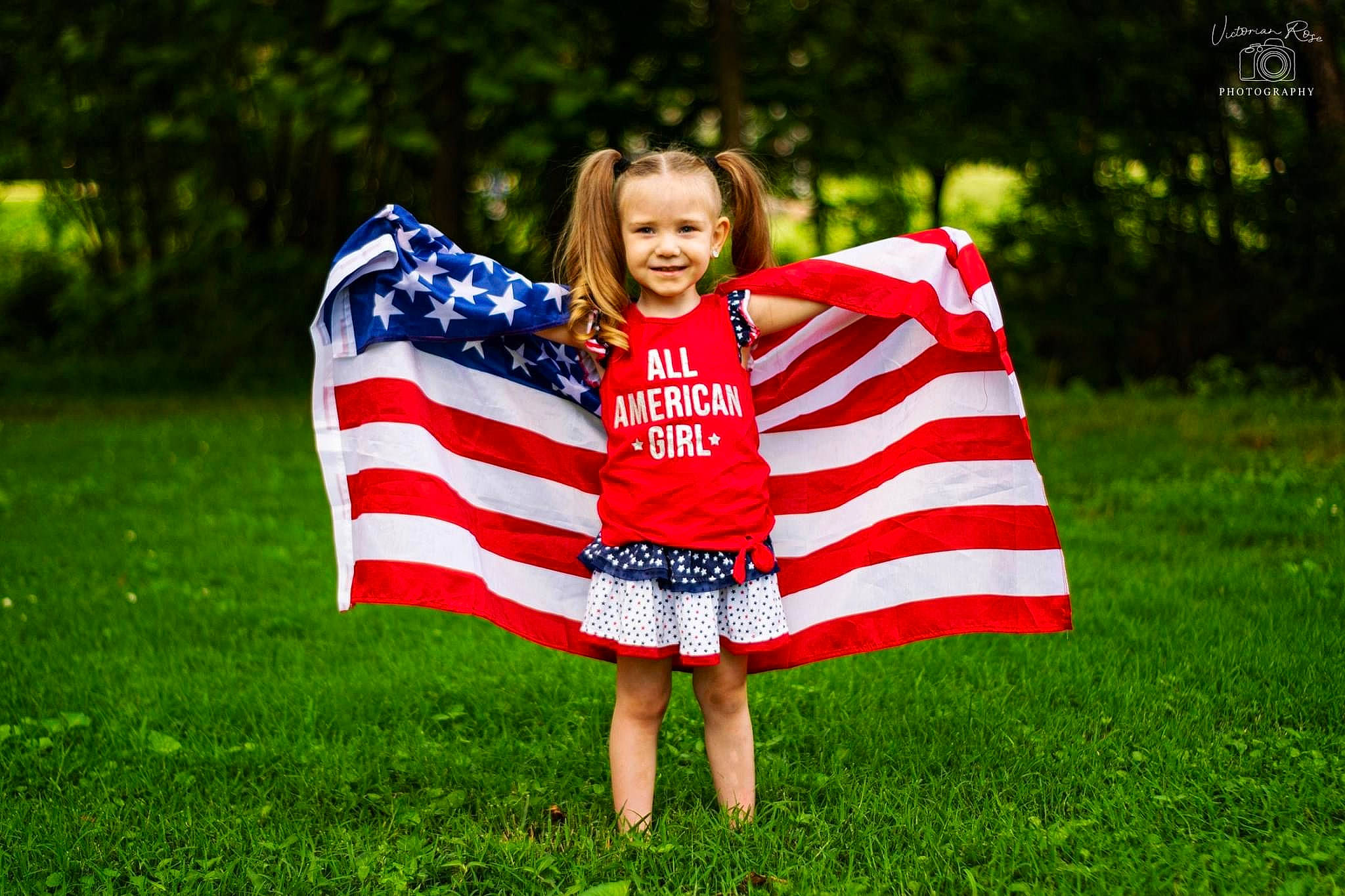 Marlie joined the competition — help win amazing prizes! child, flag, flag_of_the_united_states, fun, grass, green, happy, independence_day, joy, lawn, meadow, outerwear, person, photo_shoot, photography, plant, red, smile, spring, summer