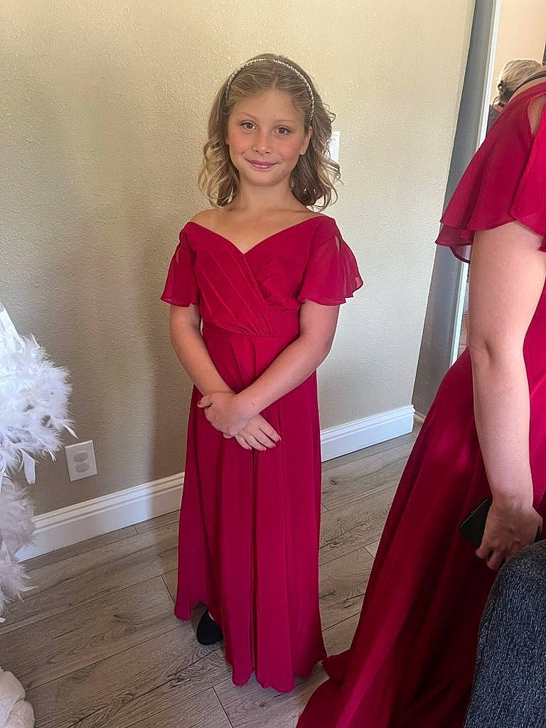 Charlette joined the competition — help win amazing prizes! bridal_party_dress, day_dress, dress, fashion_design, flooring, formal_wear, gown, hairstyle, joy, long_hair, magenta, neck, one_piece_garment, person, pink, purple, shoulder, sleeve, smile, standing