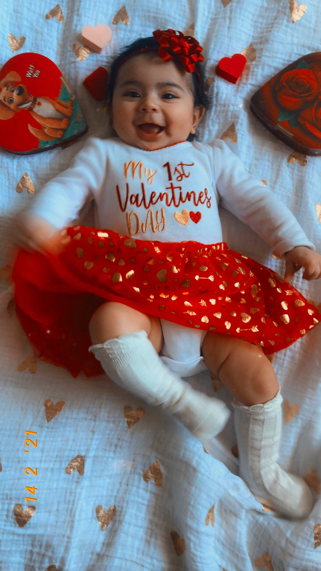 Malayah joined the competition — help win amazing prizes! baby, baby_toddler_clothing, dress, eye, face, facial_expression, happy, head, headgear, human_body, leg, orange, person, pink, red, skin, sleeve, smile, textile, toddler