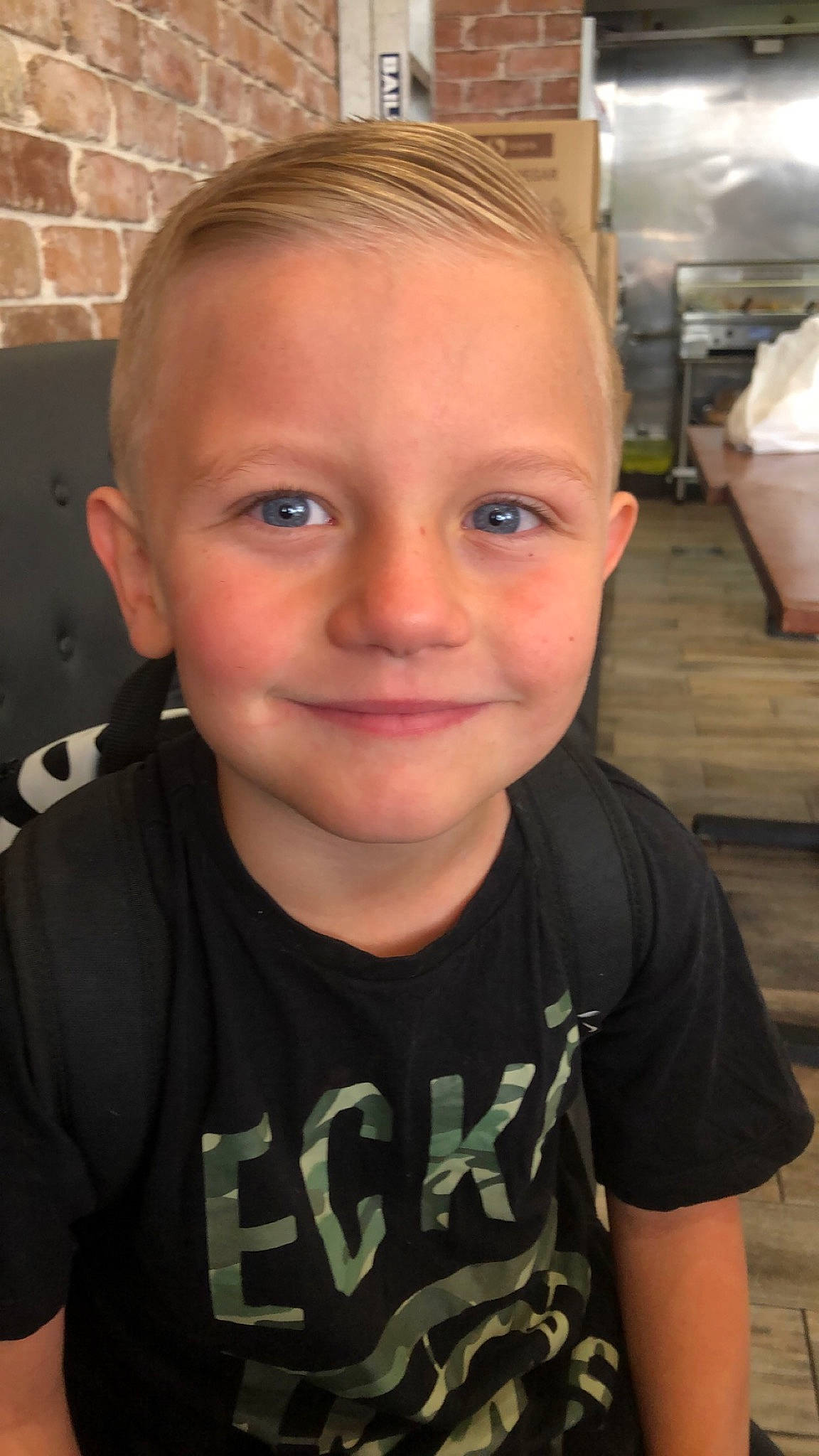 Noah is registered to the contest to win money with this photo: brick, brickwork, buzz_cut, caesar_cut, cheek, child, chin, crew_cut, ear, eyebrow, eyelash, forehead, fun, head, jaw, joy, nose, person, selfie, sleeve