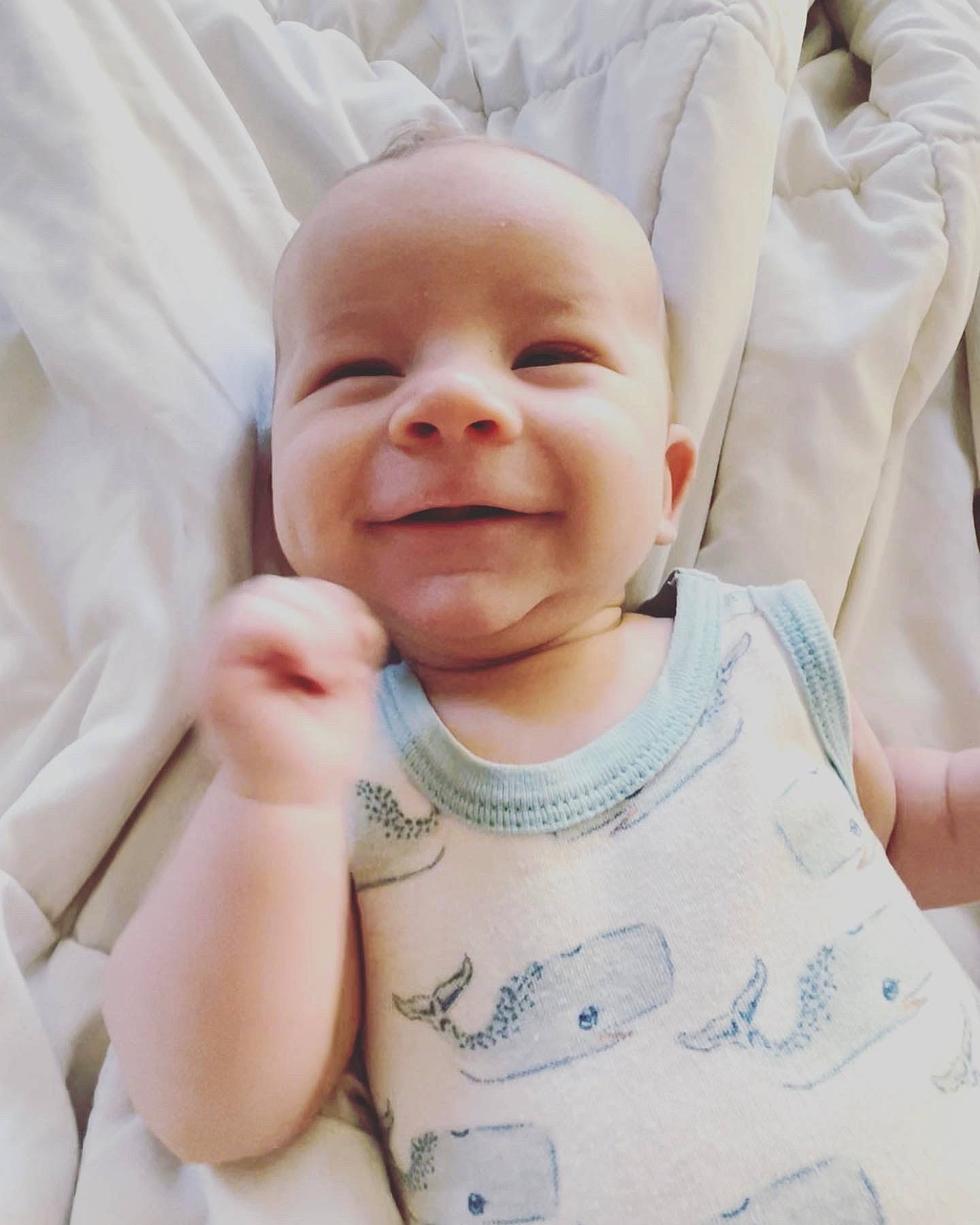 Samuel is registered to the contest to win money with this photo: baby, baby_toddler_clothing, cheek, chin, comfort, cool, eyebrow, face, finger, gesture, happy, head, joy, lip, mouth, nose, person, product, skin, sleeve