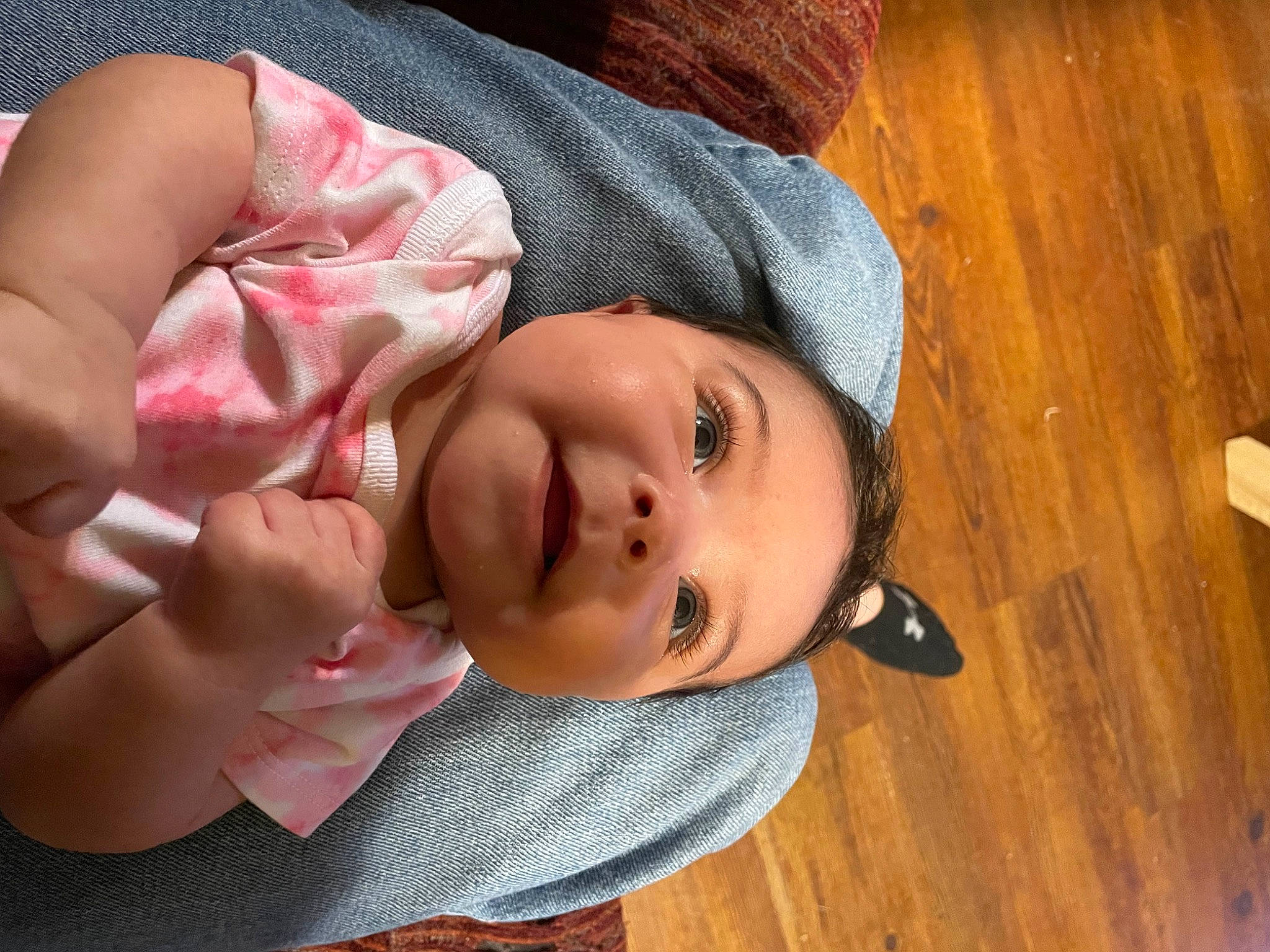 Indigo is registered to the contest to win money with this photo: baby, baby_toddler_clothing, cheek, chin, eyebrow, eyelash, finger, gesture, happy, headgear, iris, lip, mouth, neck, nose, person, skin, smile, toddler, wood