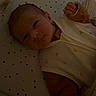 Chiara participe au concours pour gagner de l'argent avec cette photo : newborn, baby, infant, blanket, clothing, sleeping, polka_dot, bed, resting, cute, small, face, person, child, cozy, indoors, soft, warm, wrapped, newborn_baby