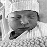 newborn, baby, sleeping, knit_hat, blanket, black_and_white, infant, cozy, cute, closeup, child, soft_texture, peaceful, portrait, wrapped, sleep, face, clothing, indoors, resting