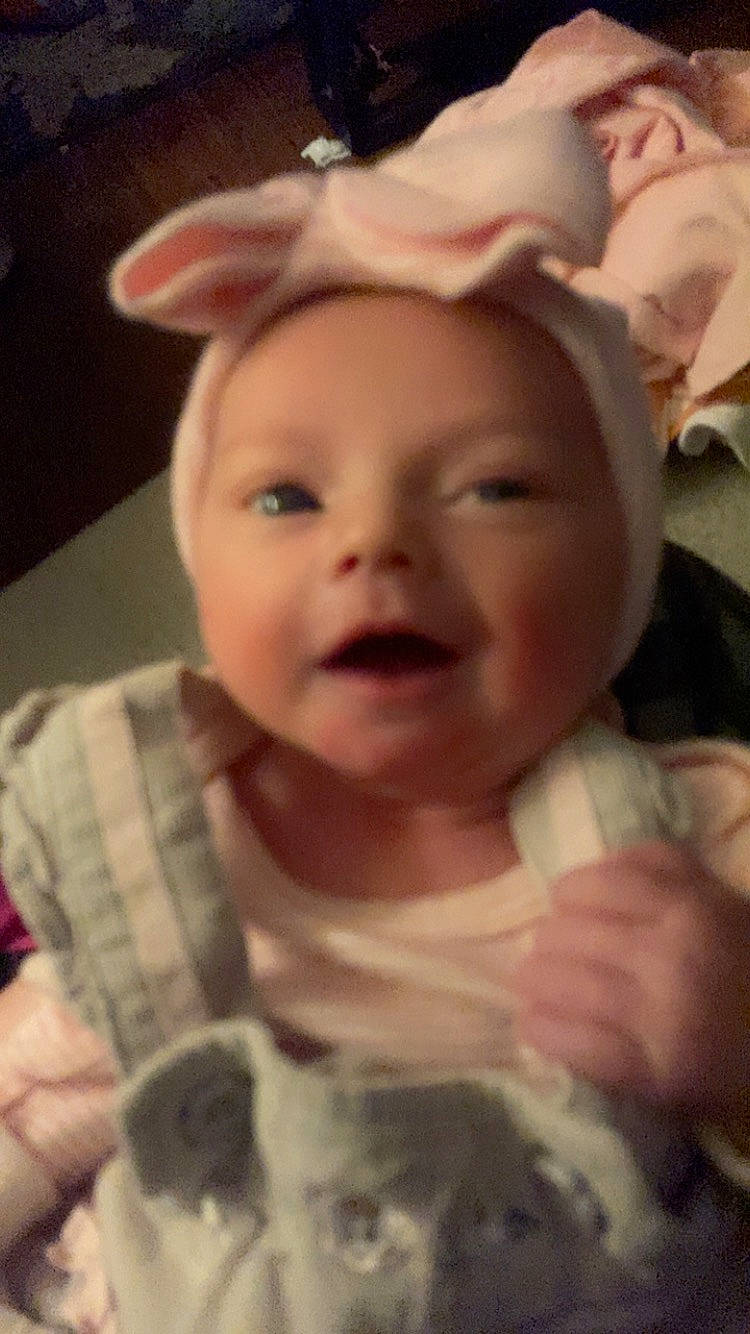 Esme is registered to the contest to win money with this photo: baby, baby_toddler_clothing, cheek, chin, cool, ear, eye, eyebrow, eyelash, finger, hair, happy, headwear, human_body, iris, lip, mouth, nose, person, skin