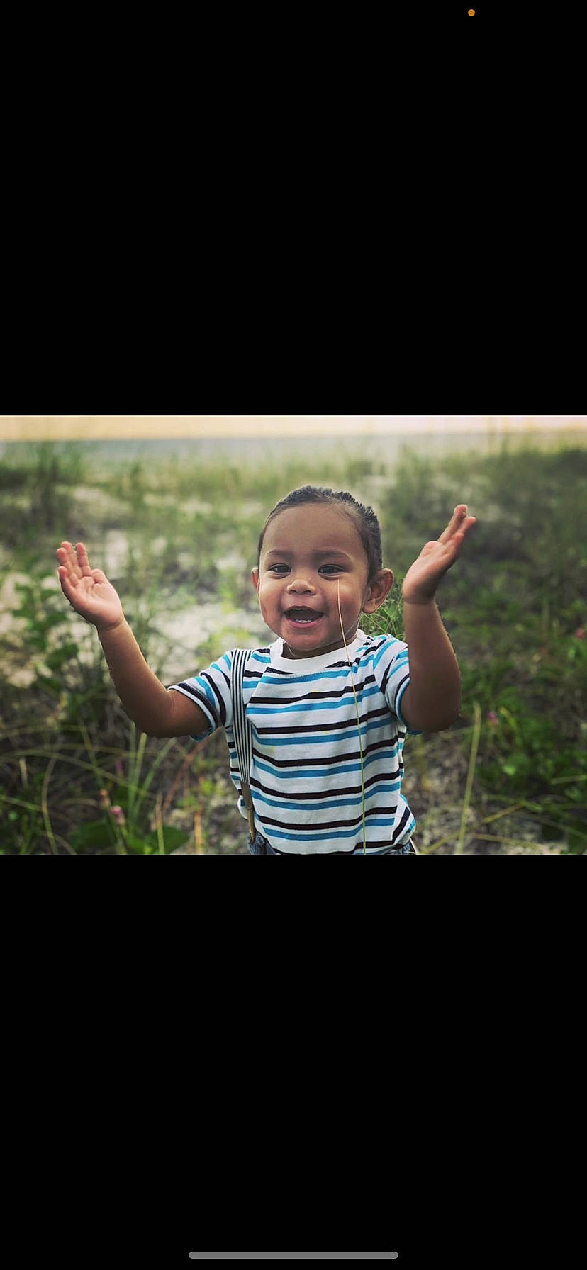 Zaidyn is registered to the contest to win money with this photo: baby, baby_toddler_clothing, child, facial_expression, finger, gesture, happy, laugh, mouth, people_in_nature, person, sleeve, summer, toddler