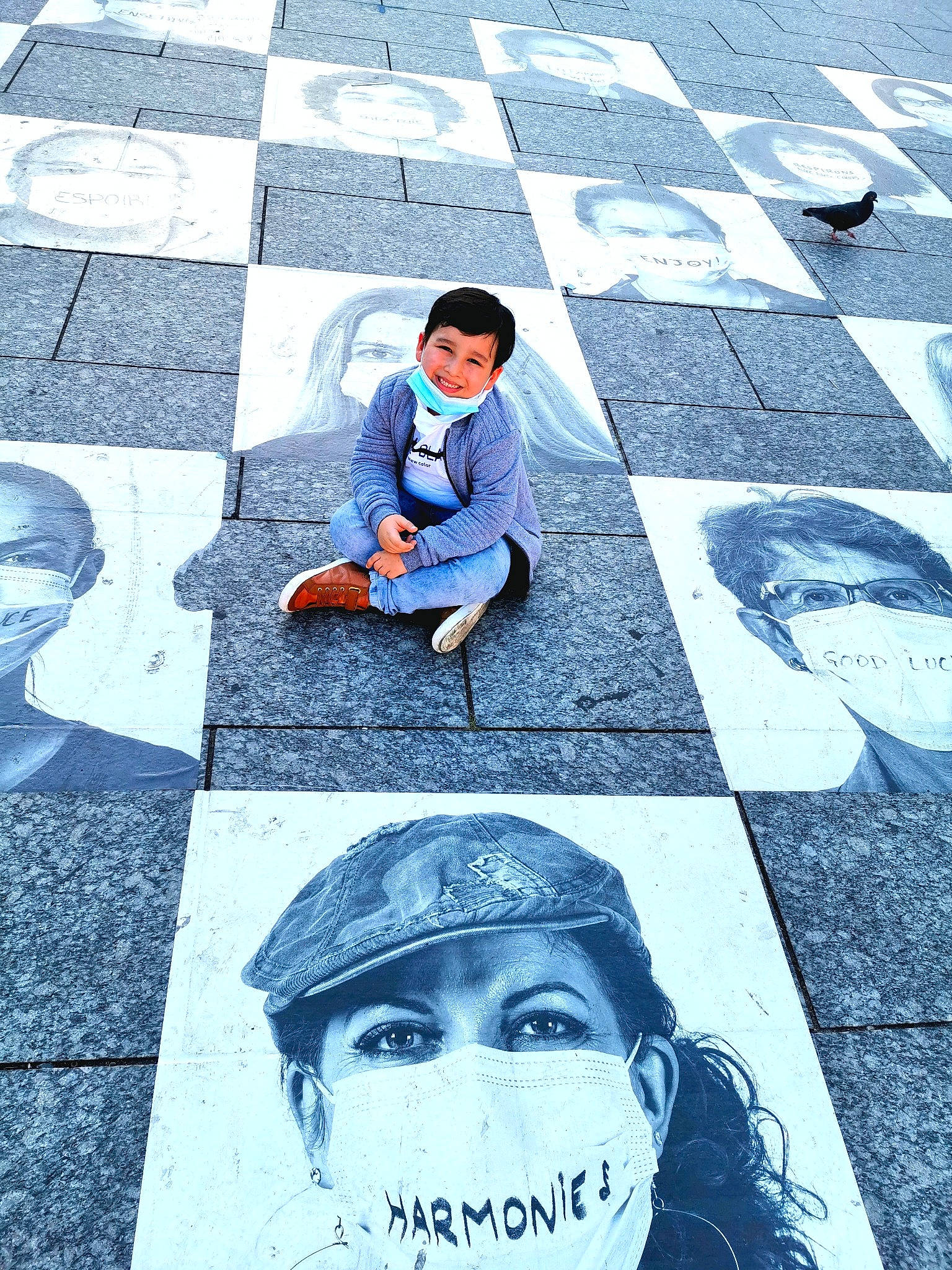 Christopher participe au concours pour gagner de l'argent avec cette photo : art, asphalt, child, city, cool, drawing, floor, flooring, illustration, joy, person, photography, plant, public_space, road_surface, sidewalk, sitting, snapshot, street, street_art