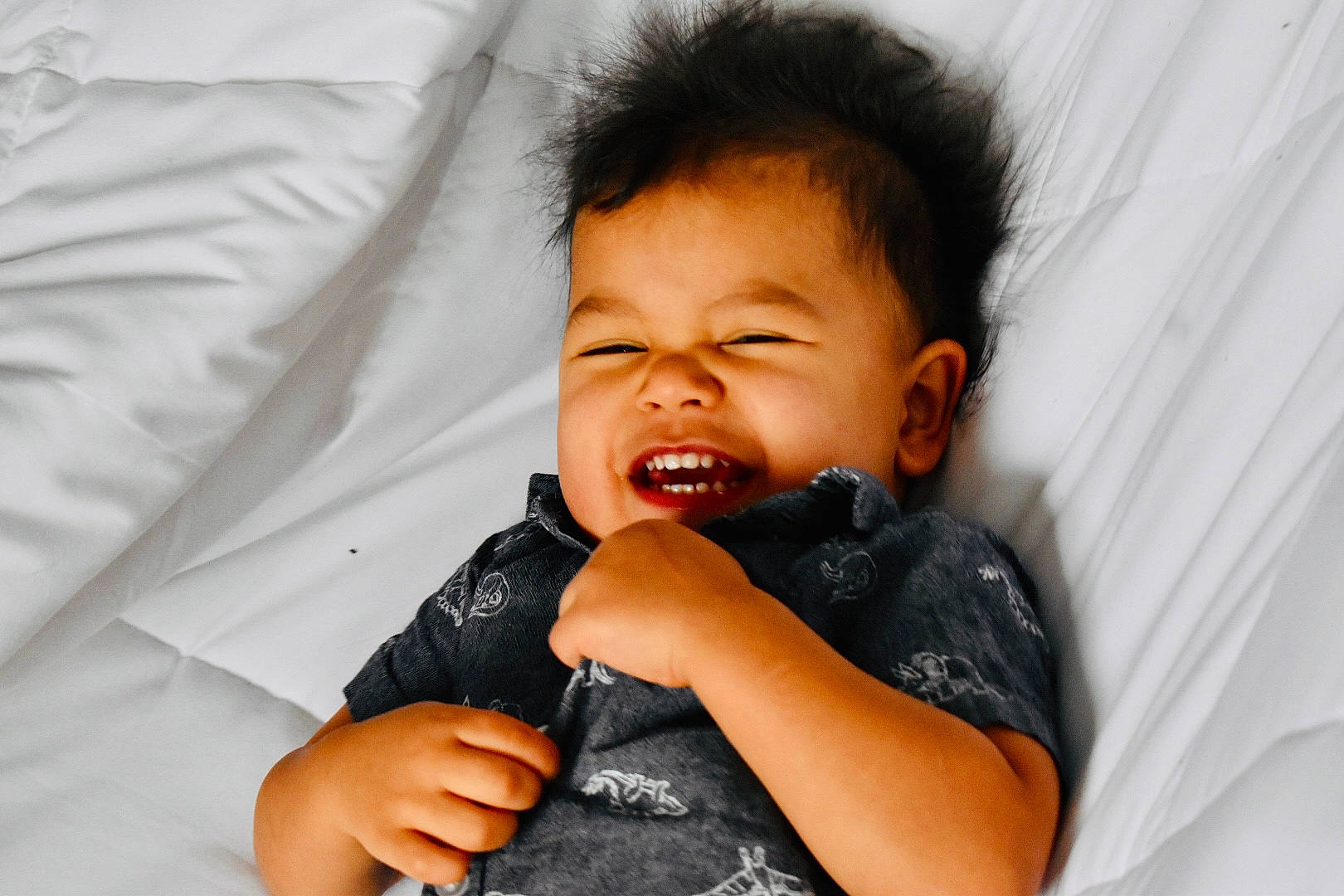 Josiah is registered to the contest to win money with this photo: baby, cheek, comfort, eye, eyebrow, eyelash, finger, flash_photography, gesture, hand, happy, head, iris, lip, mouth, neck, nose, person, skin, sleeve