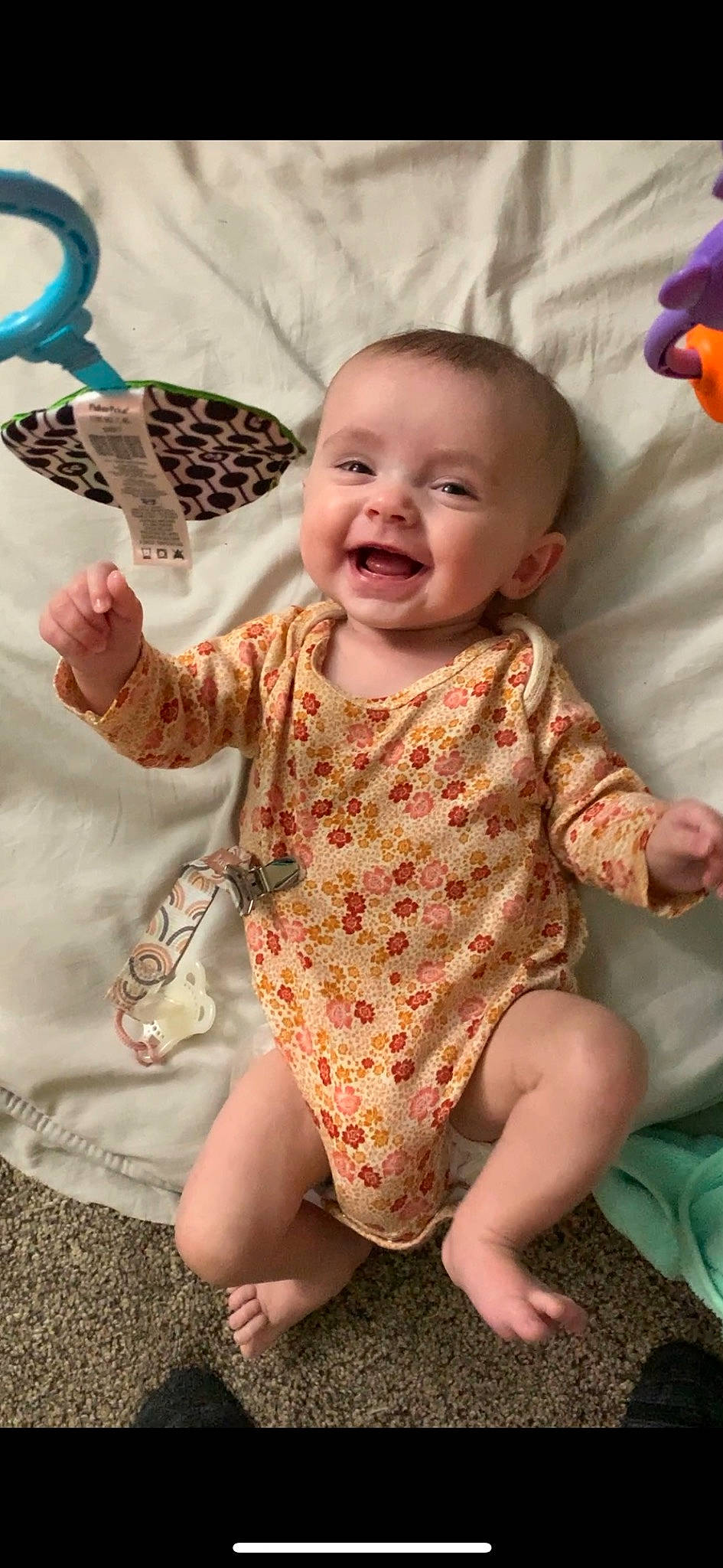 Nova is registered to the contest to win money with this photo: baby_toddler_clothing, cheek, chin, dress, eye, face, finger, gesture, happy, head, iris, joy, lip, mouth, neck, person, pink, product, skin, sleeve