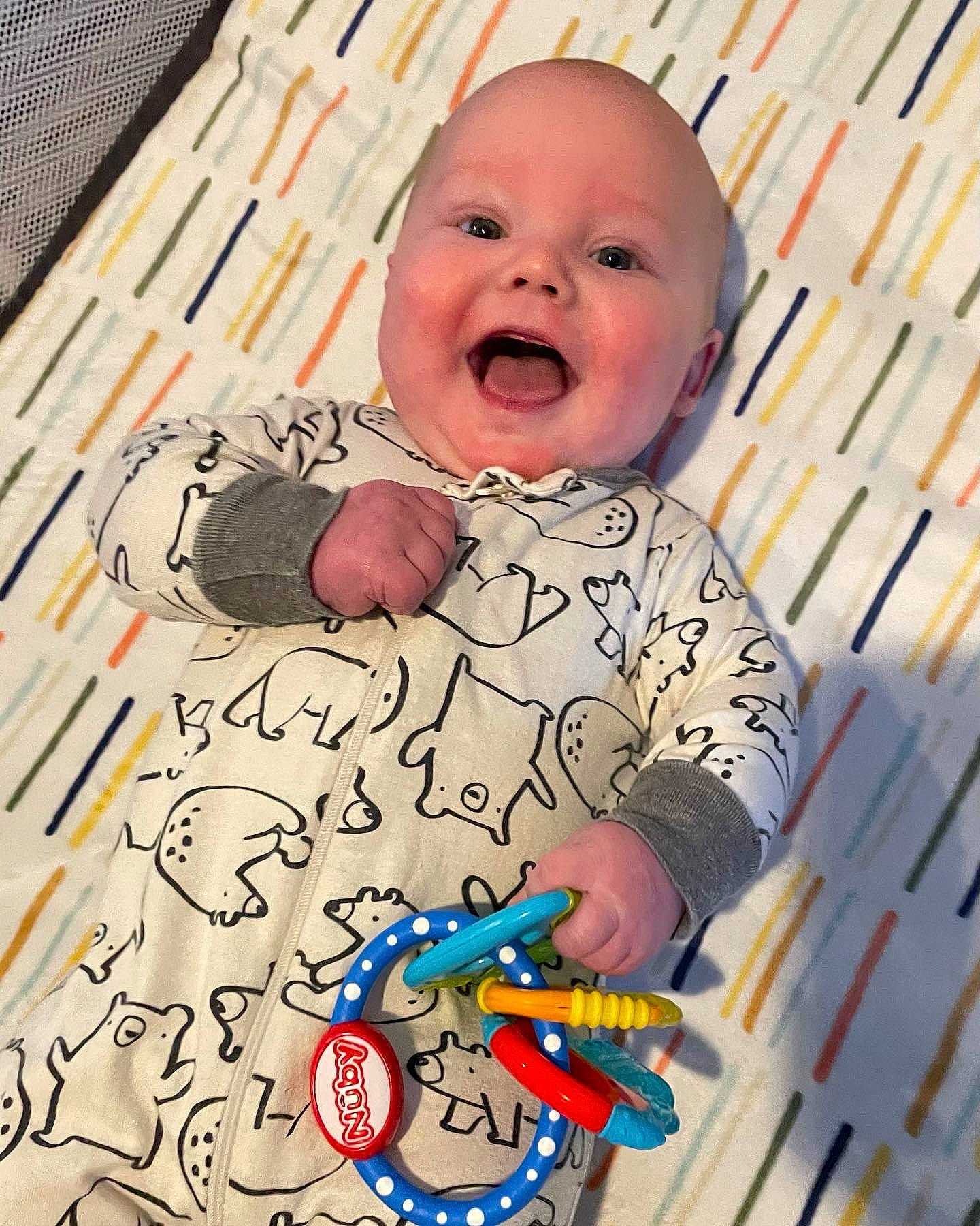 Cameron joined the competition — help win amazing prizes! baby, baby_playing_with_toys, baby_safety, baby_toddler_clothing, cheek, eye, happy, head, human_body, infant_bed, iris, mouth, nose, organ, person, product, skin, sleeve, smile, textile