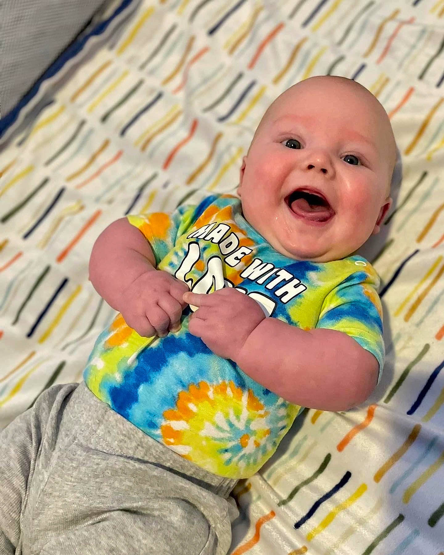 Cameron joined the competition — help win amazing prizes! baby, baby_laughing, baby_products, baby_toddler_clothing, cheek, child, comfort, eye, face, fun, happy, head, headwear, iris, pattern, person, skin, sleeve, smile, t_shirt