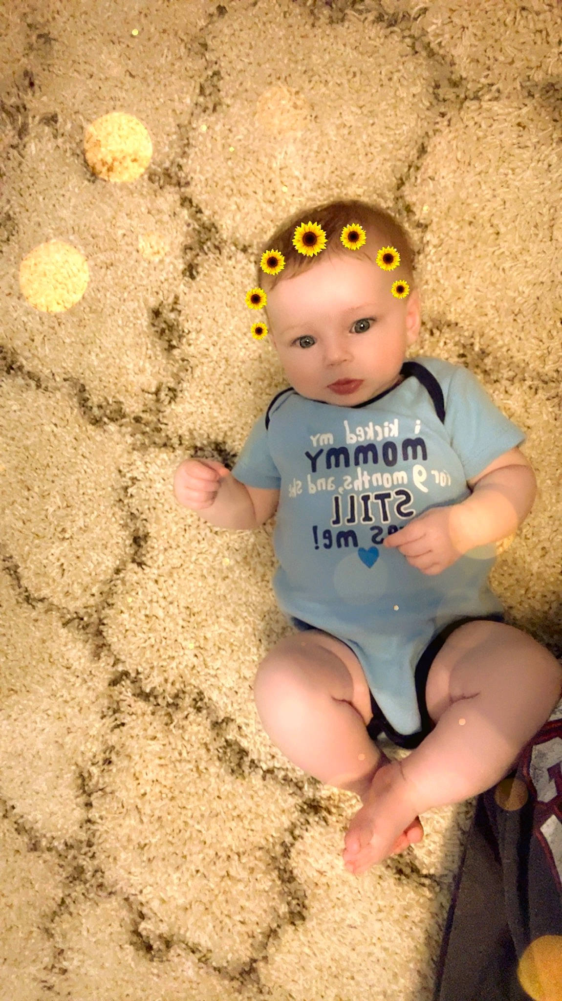 Yreva is registered to the contest to win money with this photo: baby, baby_toddler_clothing, beach, cap, child, fashion_accessory, foot, fun, grass, happy, headgear, human_leg, landscape, people_in_nature, person, play, sand, sitting, soil, thigh