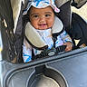 Brylee is registered to the contest to win money with this photo: baby, smiling, child, stroller, hat, clothing, seatbelt, sunhat, happy, outdoor, infant, face, person, babygear, seat, cute, young, safety, starfish, pattern