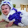 Hazely is registered to the contest to win money with this photo: baby, bodypart, bonnet, cap, clothing, costume, dress, face, finger, furniture, hand, hardwood, hat, head, person, photography, portrait, sitting, sunhat, wood