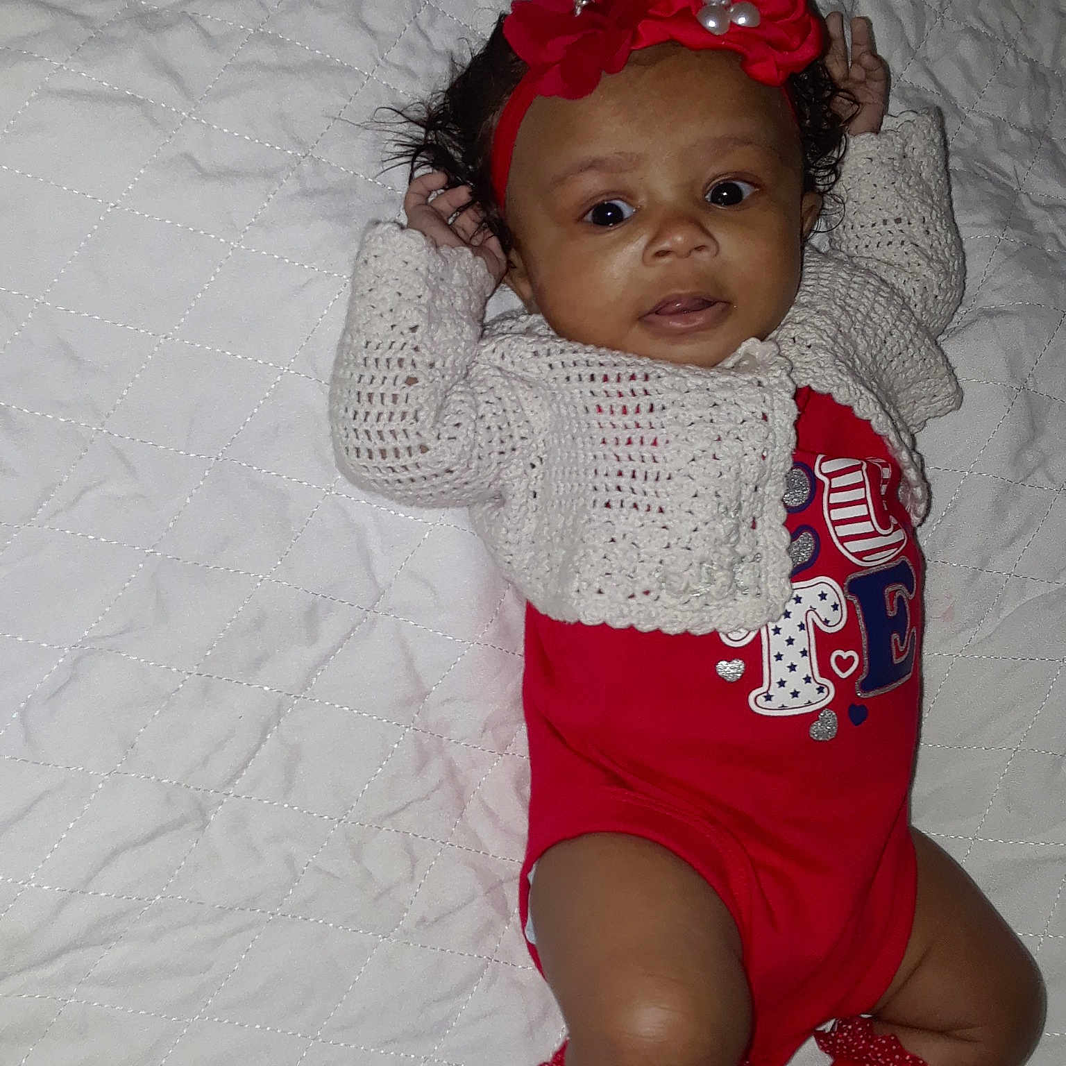 Ailani joined the competition — help win amazing prizes! child, fun, girl, hair_accessory, headgear, headpiece, infant, person, pink, product, red, skin, smile, textile, toddler, white