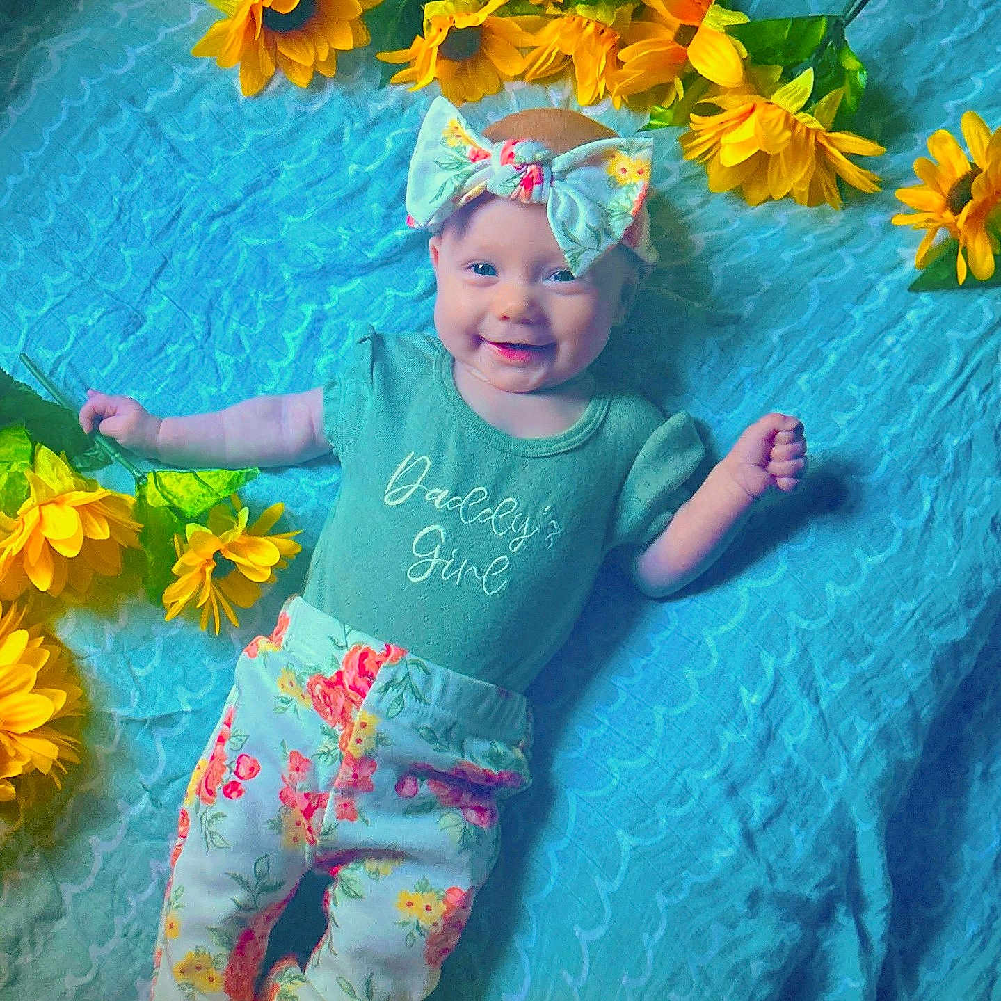 Ariella joined the competition — help win amazing prizes! anemone, baby, clothing, daisy, face, flower, happy, hat, head, herbal, herbs, leaf, pants, person, petal, photography, plant, portrait, pottedplant, summer
