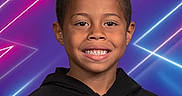 Bellamy joined the competition — help win amazing prizes! background, blue, boy, casual, child, colorful, curly_hair, expression, face, fashion, happy, hoodie, lighting, neon, person, portrait, purple, smile, studio, young