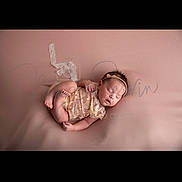 Ailany is registered to the contest to win money with this photo: newborn, baby, sleeping, lace, headband, infant, pink_background, soft_texture, portrait, peaceful, cute, child, resting, small, delicate, studio_photo, wrapped, adorable, lying_down, infant_clothing
