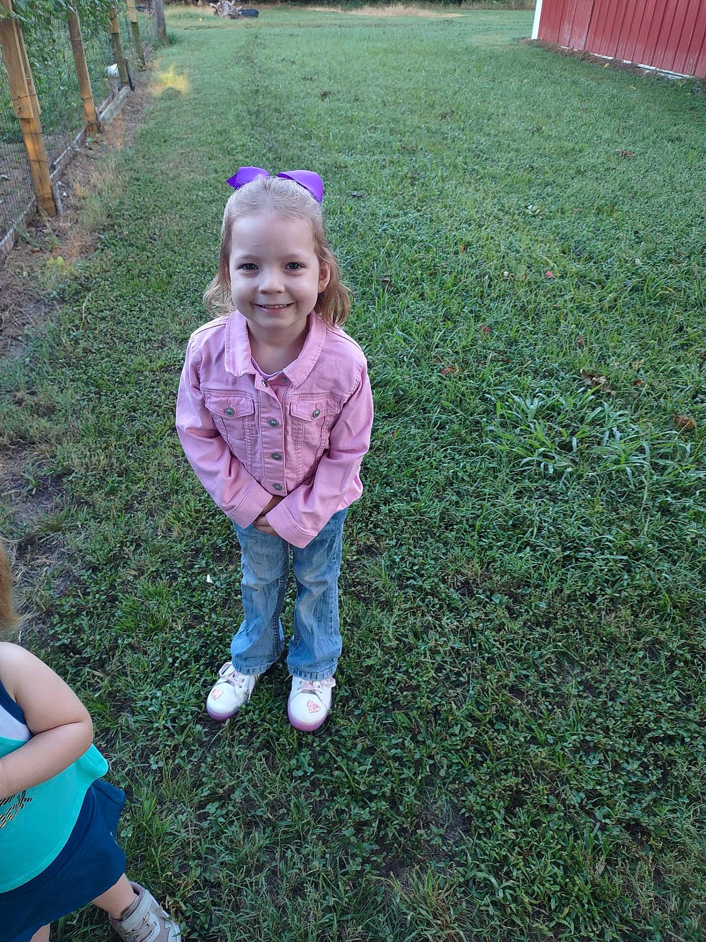 Isabella joined the competition — help win amazing prizes! backyard, child, clothing, face, female, footwear, girl, grass, head, jeans, lawn, nature, outdoors, pants, park, person, photography, plant, portrait, yard