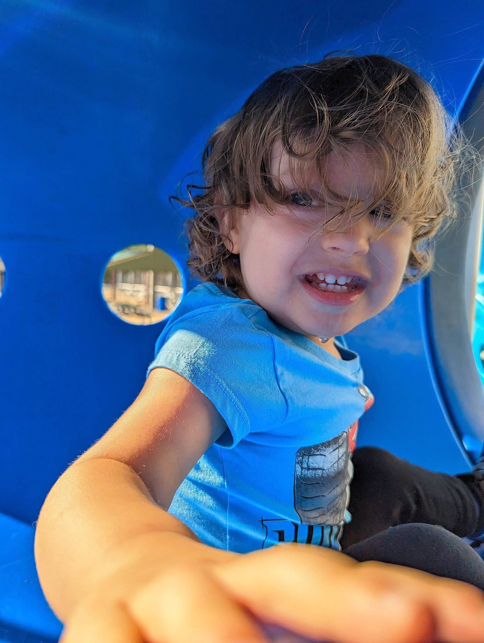 Drayce is registered to the contest to win money with this photo: azure, baby_toddler_clothing, blue, child, elbow, electric_blue, fun, happy, human_leg, joy, leisure, lifejacket, person, personal_protective_equipment, play, recreation, sitting, skin, smile, thigh