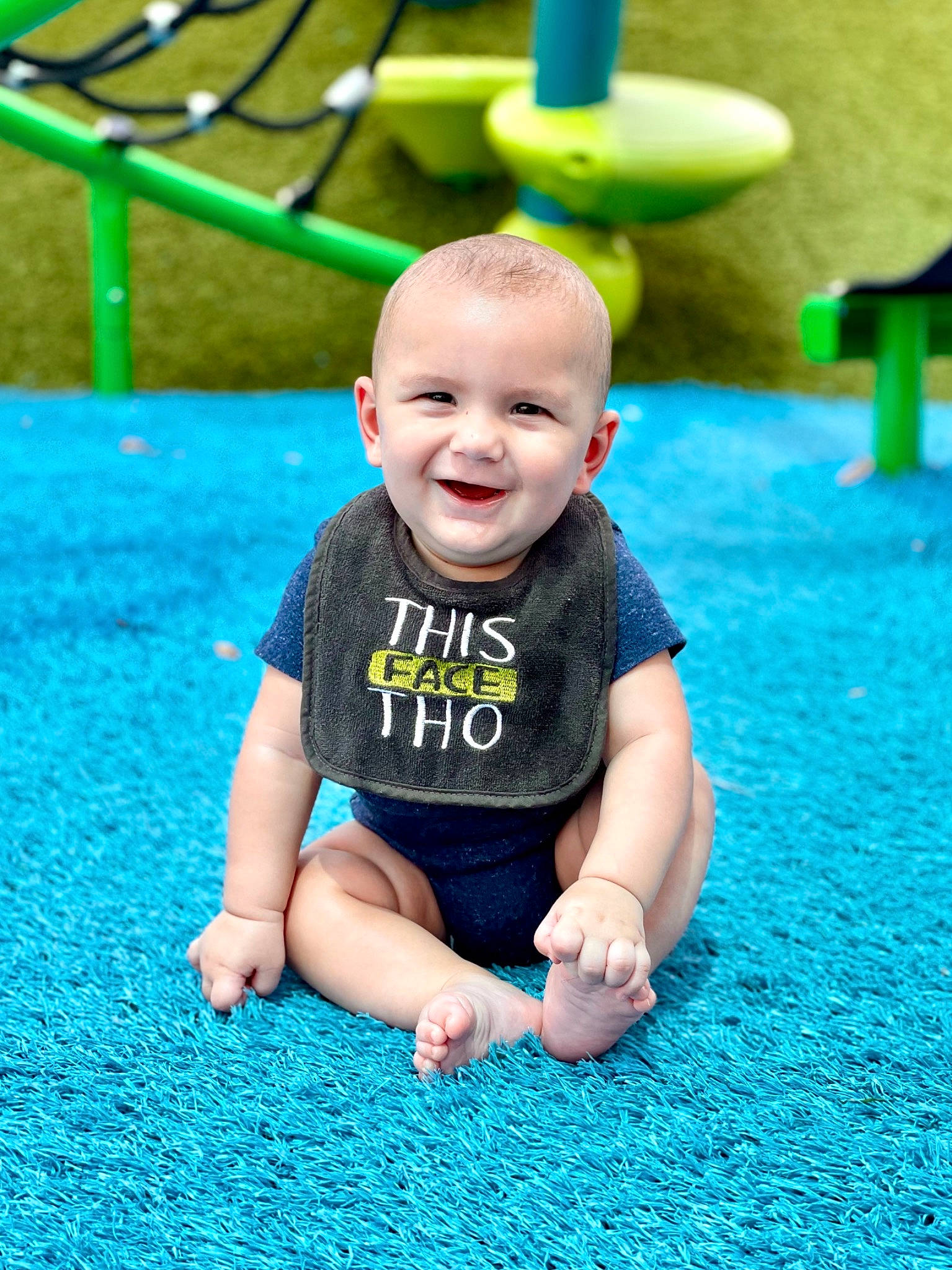 Jensen is registered to the contest to win money with this photo: aqua, azure, baby, baby_toddler_clothing, blue, flooring, fun, grass, green, happy, joy, leaf, leisure, nature, people_in_nature, person, photograph, plant, smile, summer