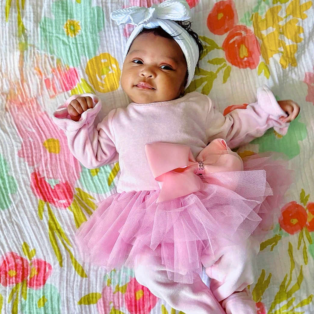 Kyla joined the competition — help win amazing prizes! accessories, baby, bed, blanket, bonnet, cap, clothing, costume, dress, face, furniture, hat, head, newborn, person, photography, portrait, purple, quilt, sleeping